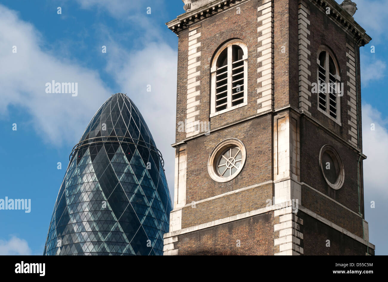 30 St Mary Axe (Gherkin or Swiss Re Building) Skyscraper and Tower of St Botolph-Without-Aldgate Church, London, England, UK Stock Photo
