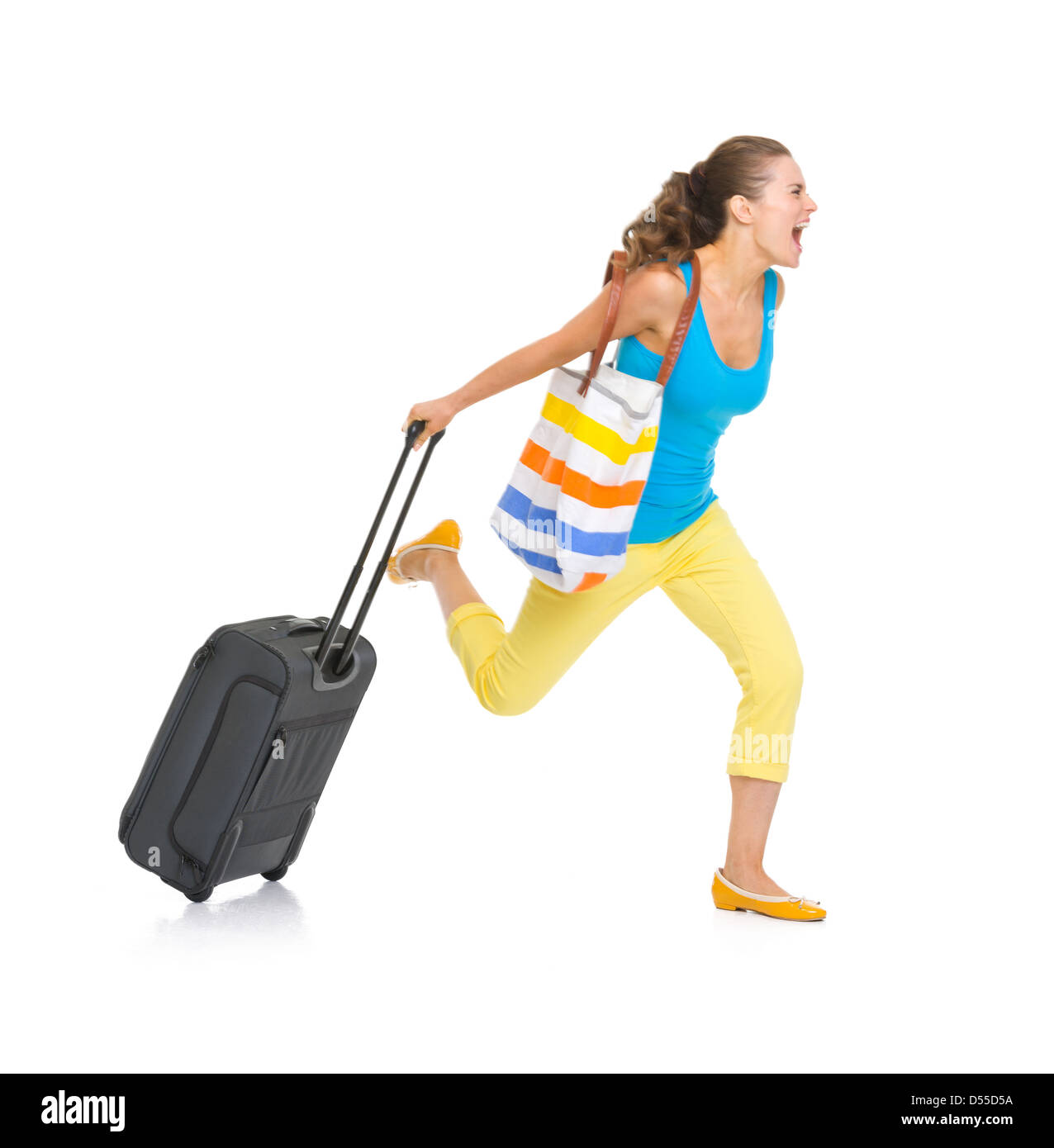 Concerned young tourist woman with wheel bag rushing Stock Photo - Alamy