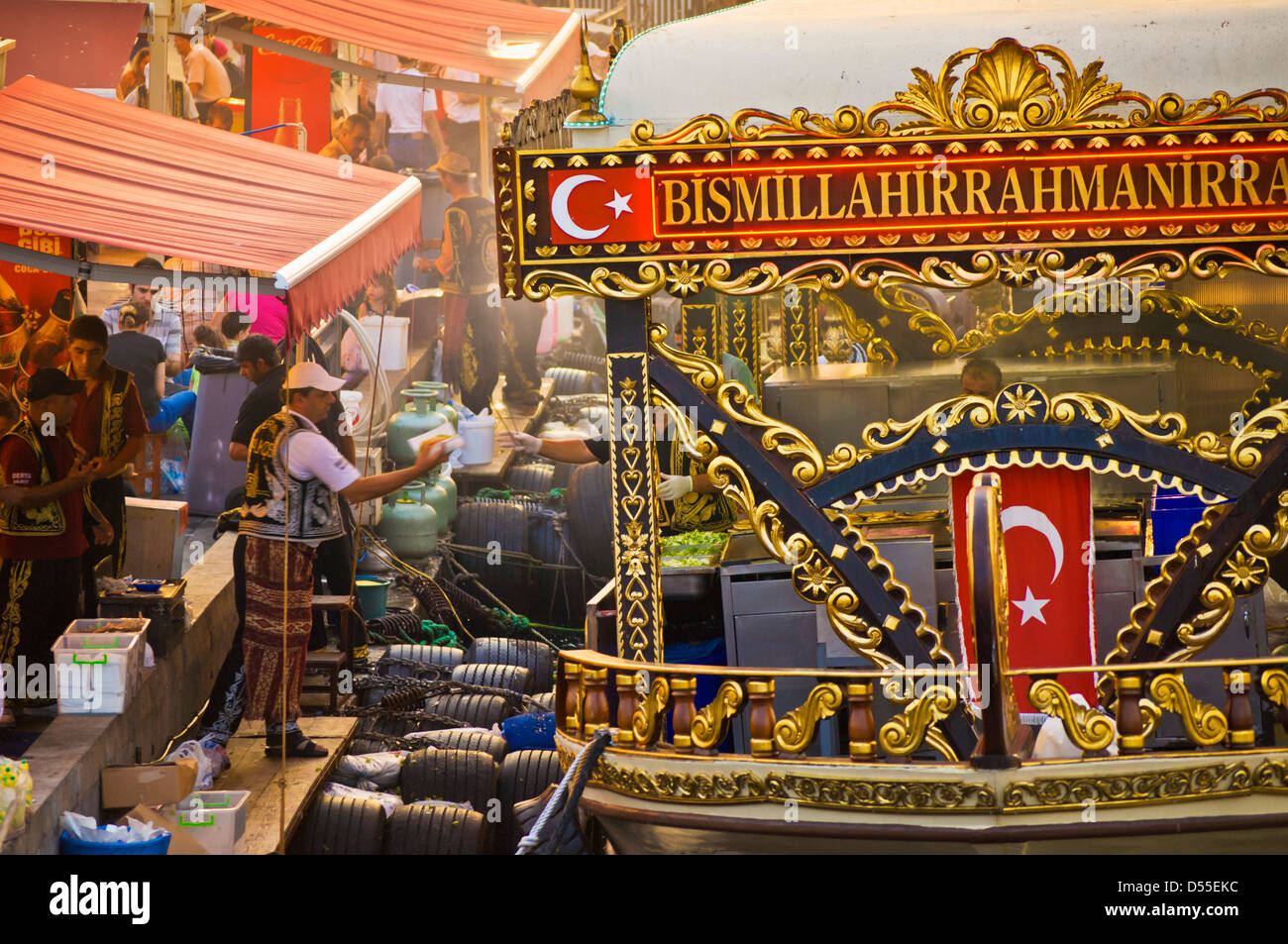 Traditional boats cooking and selling food, Eminonu, Galeta bridge, Istanbul, Turkey, Europe Travel Stock Photo