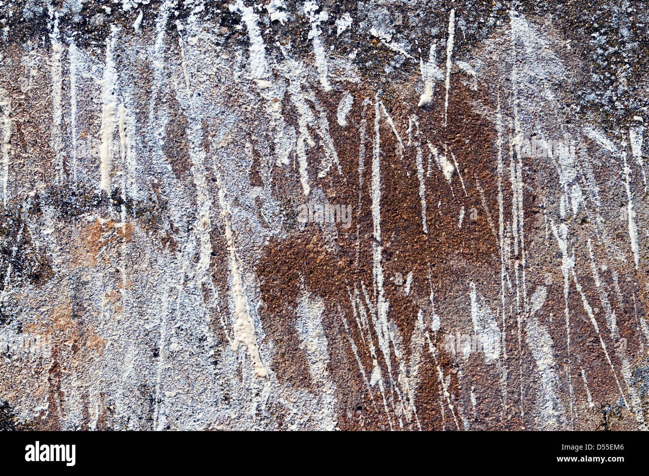 Abstract paint splashes on rendered wall - France. Stock Photo