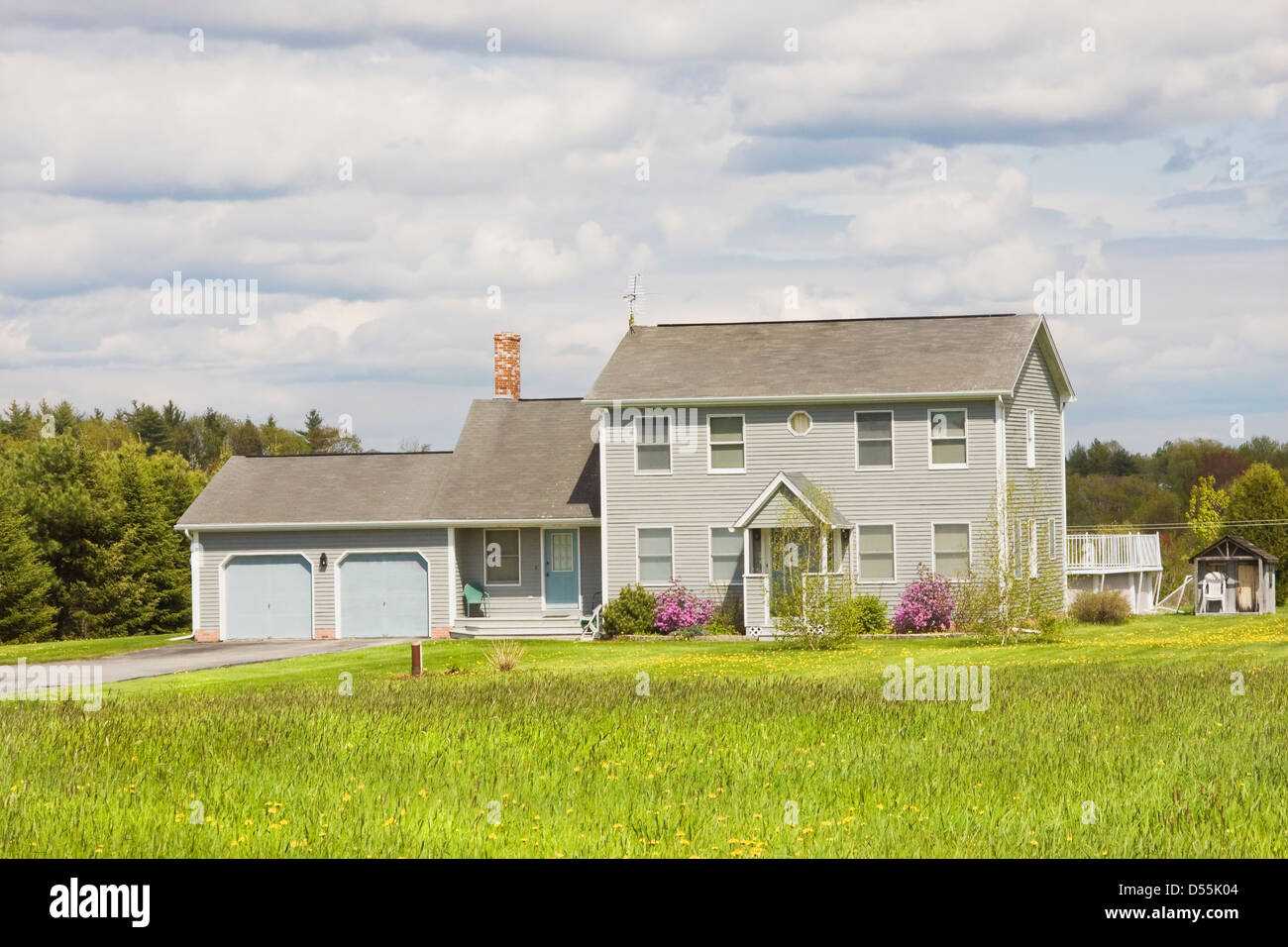 Colonial house in spring Maine. Stock Photo