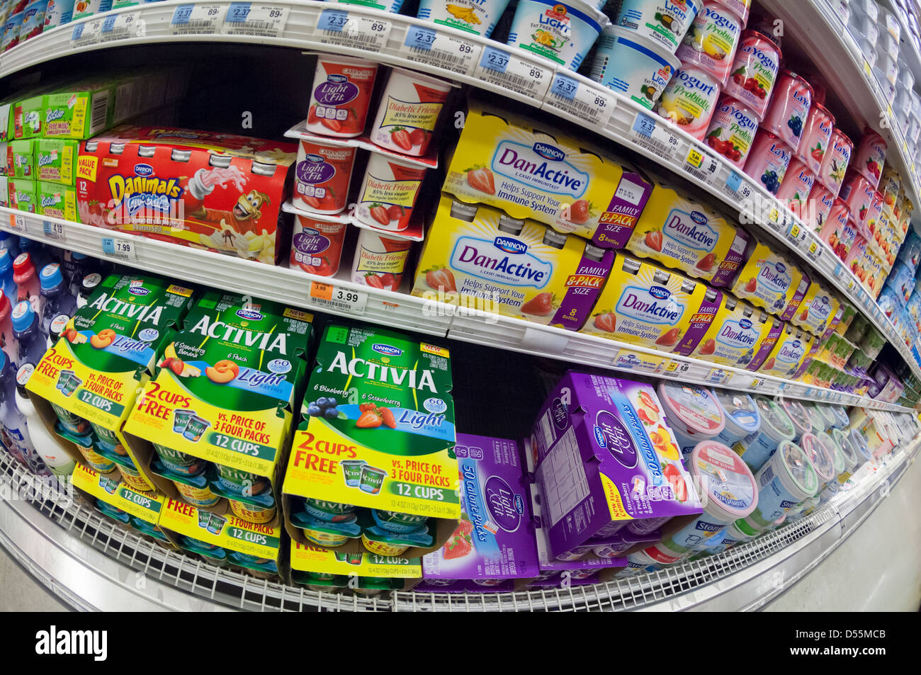 Containers of various brands of Dannon Yogurt are seen on a supermarket shelf on Thursday, March 21, 2013. (© Richard B. Levine) Stock Photo