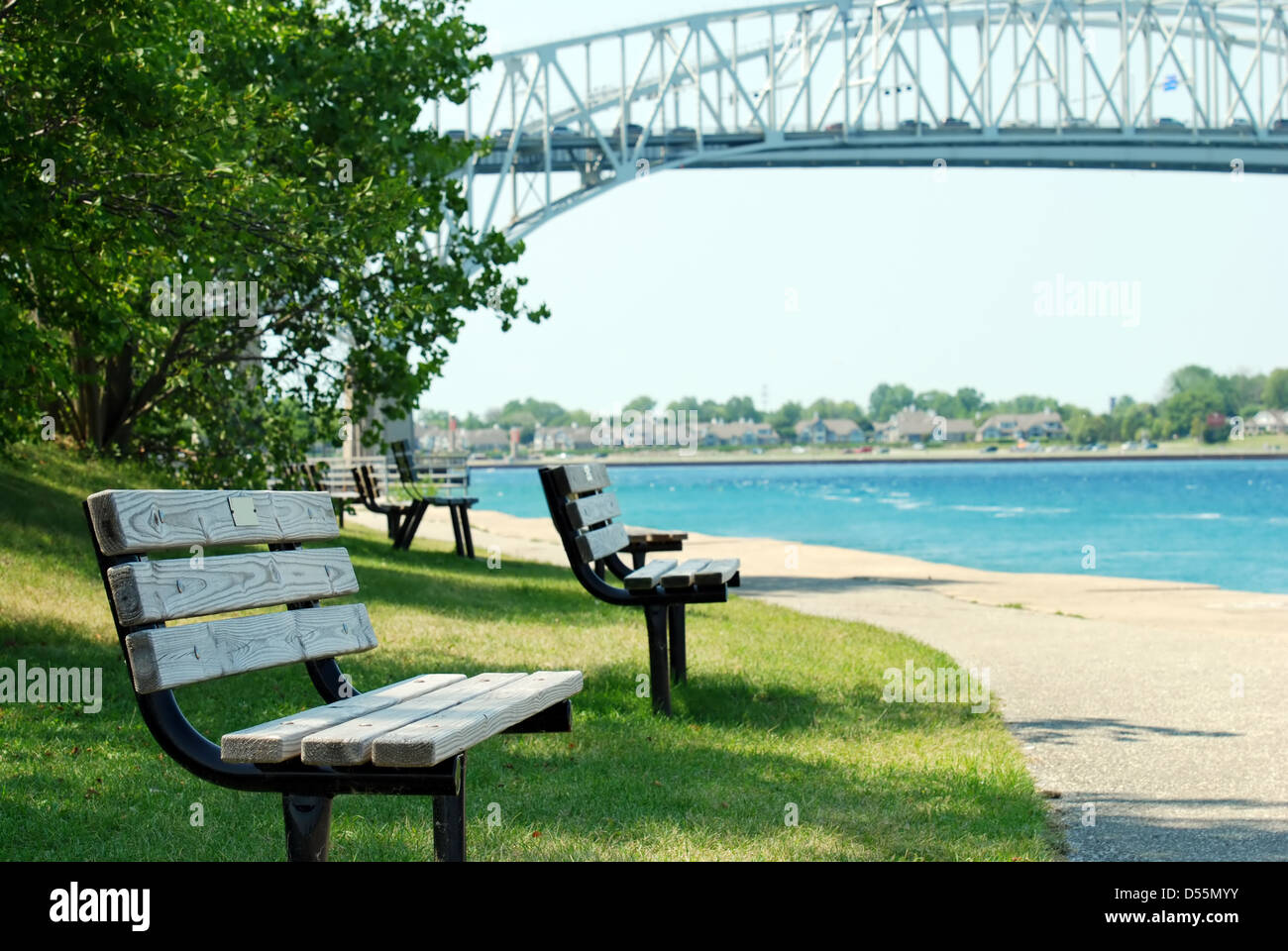 park bench Sarnia Ontario blue water bridge Stock Photo