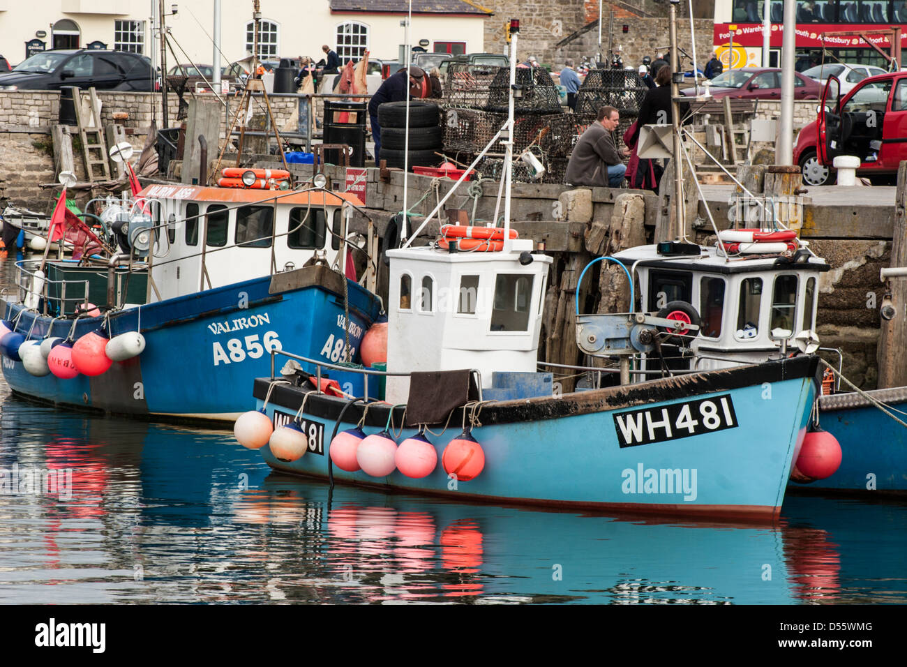 Fishing boats in West Bay, Dorset Stock Photo - Alamy