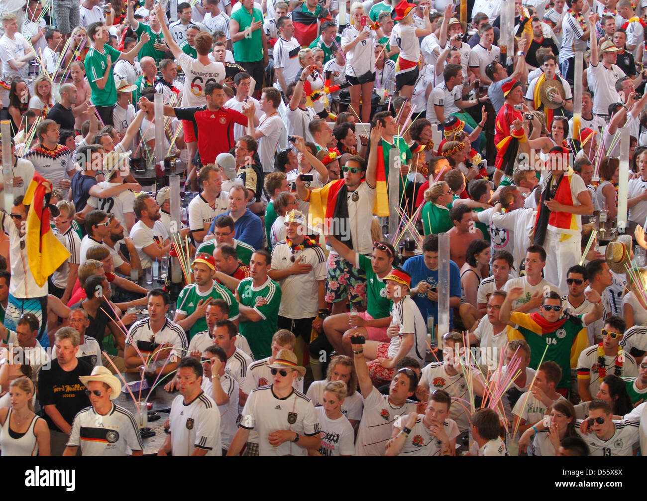Germany soccer national team supporters react while they watch their European cup semifinal