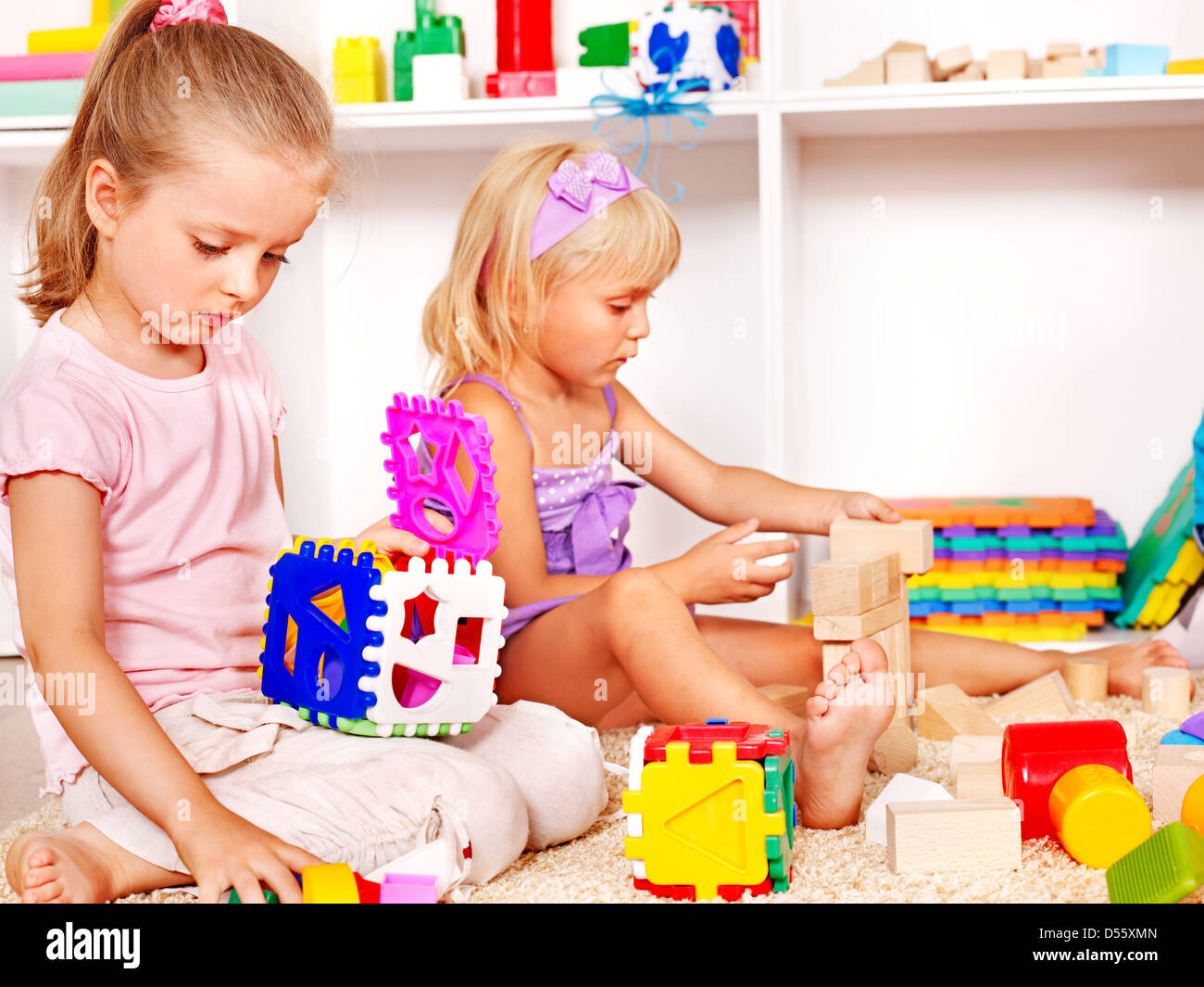 Stacking Blocks Kinder Children in kindergarten stacking block Stock Photo - Alamy