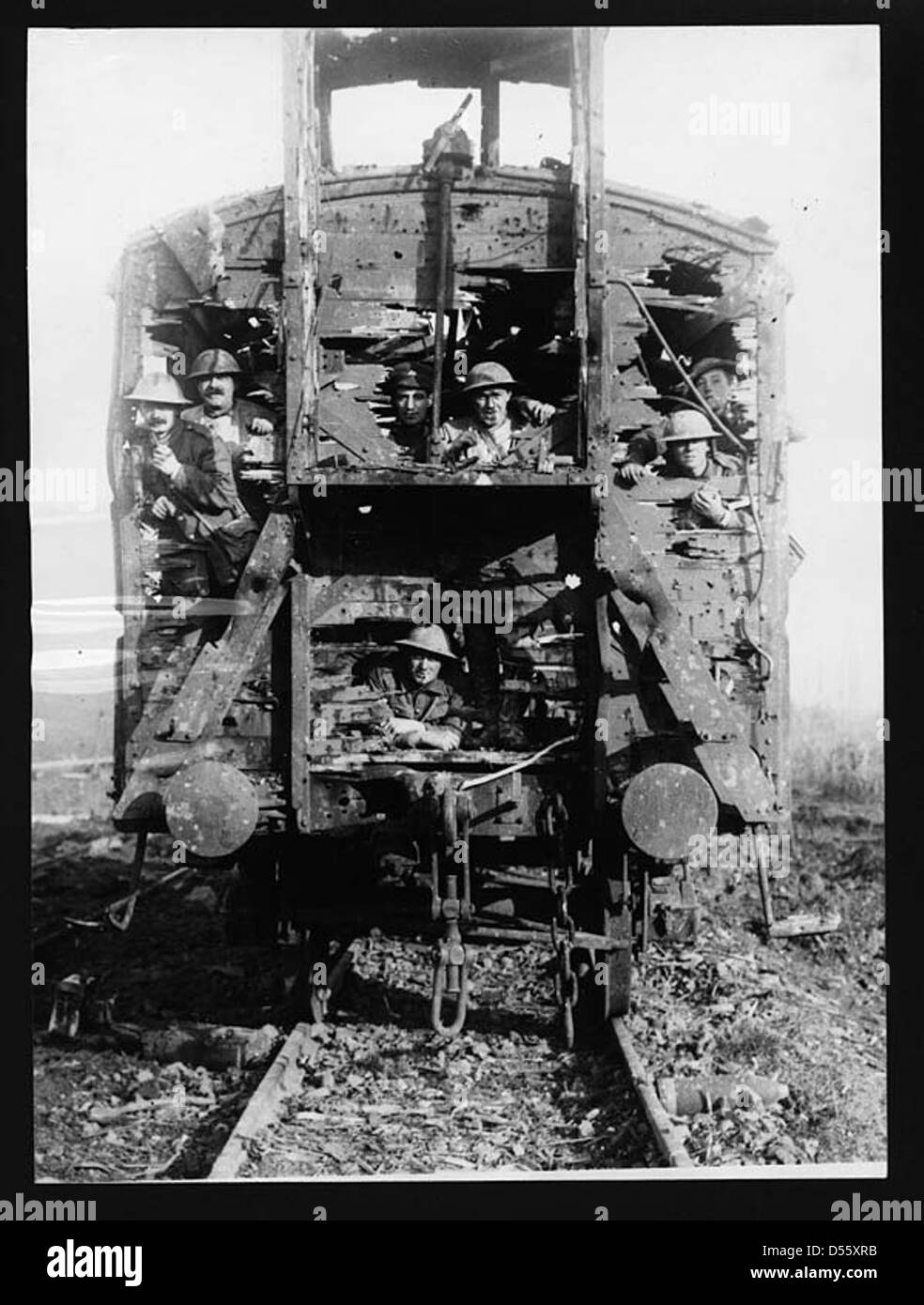 Derelict train with soldiers standing in it, France, during World War I Stock Photo