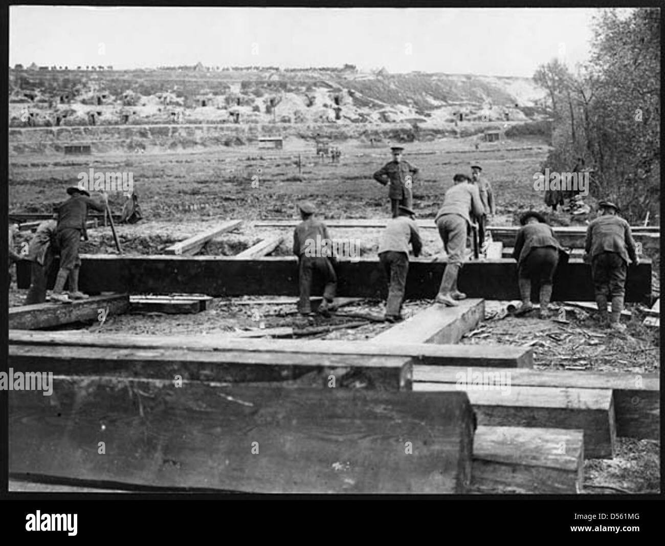 Rolling a big pile up for bridging purposes Stock Photo Alamy