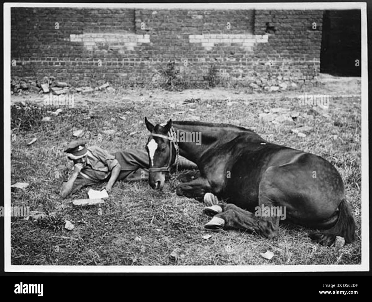Two soldiers share a moment of camaraderie, reflecting the strong bonds ...