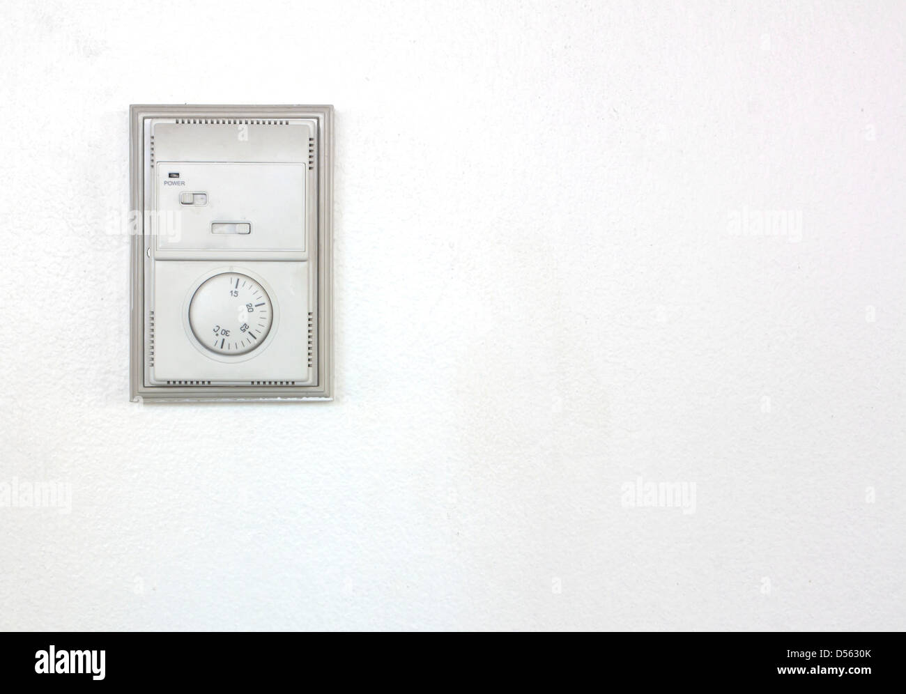 Room air conditioner thermostat. Stock Photo