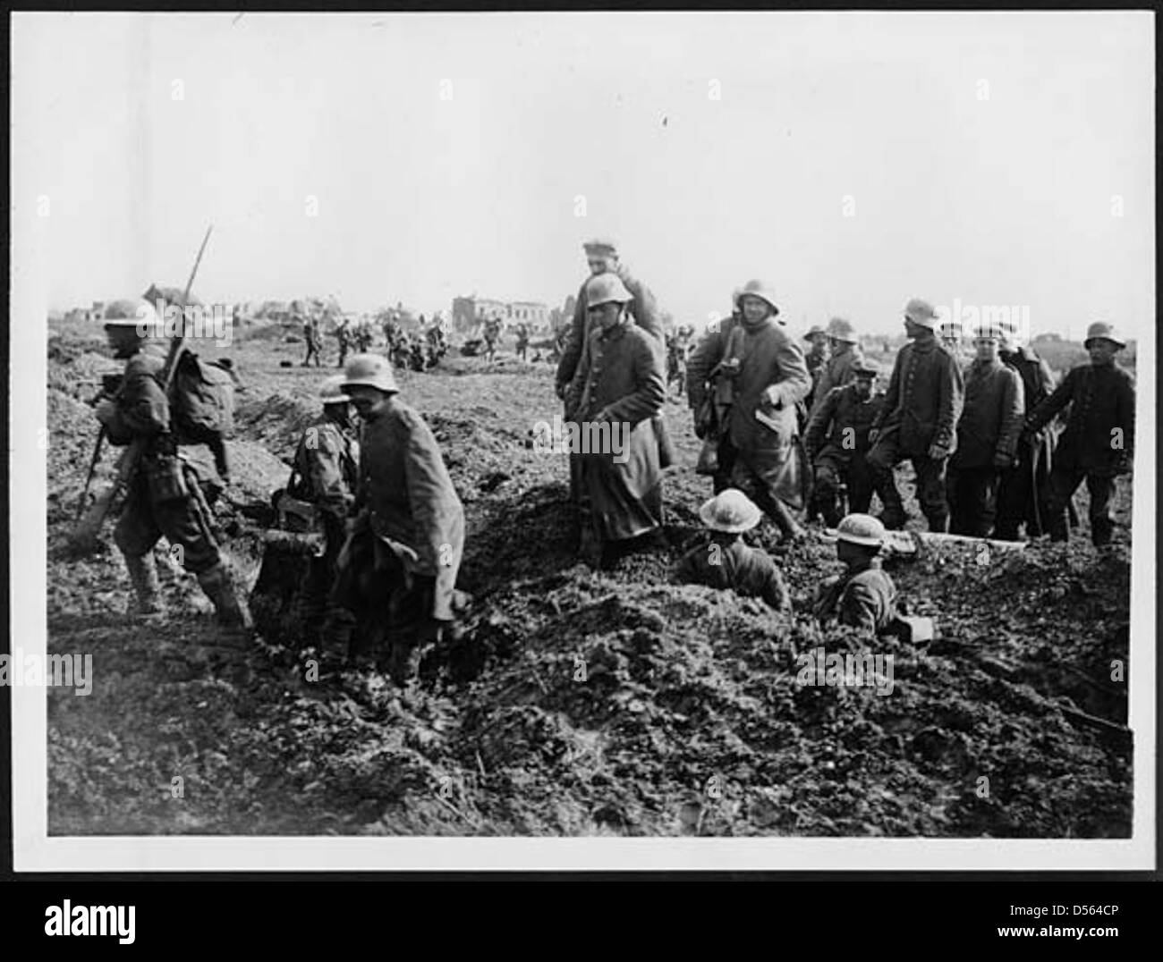 Prisoners of war are escorted into captivity, while additional troops ...