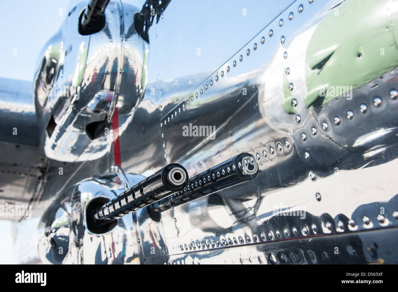 Mounted guns reflect in the polished chrome of a World War II era Mitchell B-25 Bomber at a Columbus, Georgia air show. Stock Photo