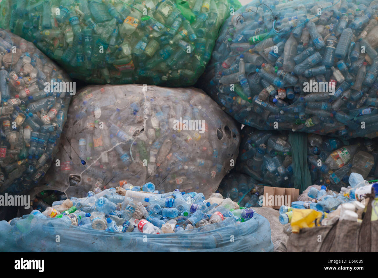 Bags of plastic bottles at a recycling station, Kisumu, Kenya Stock Photo