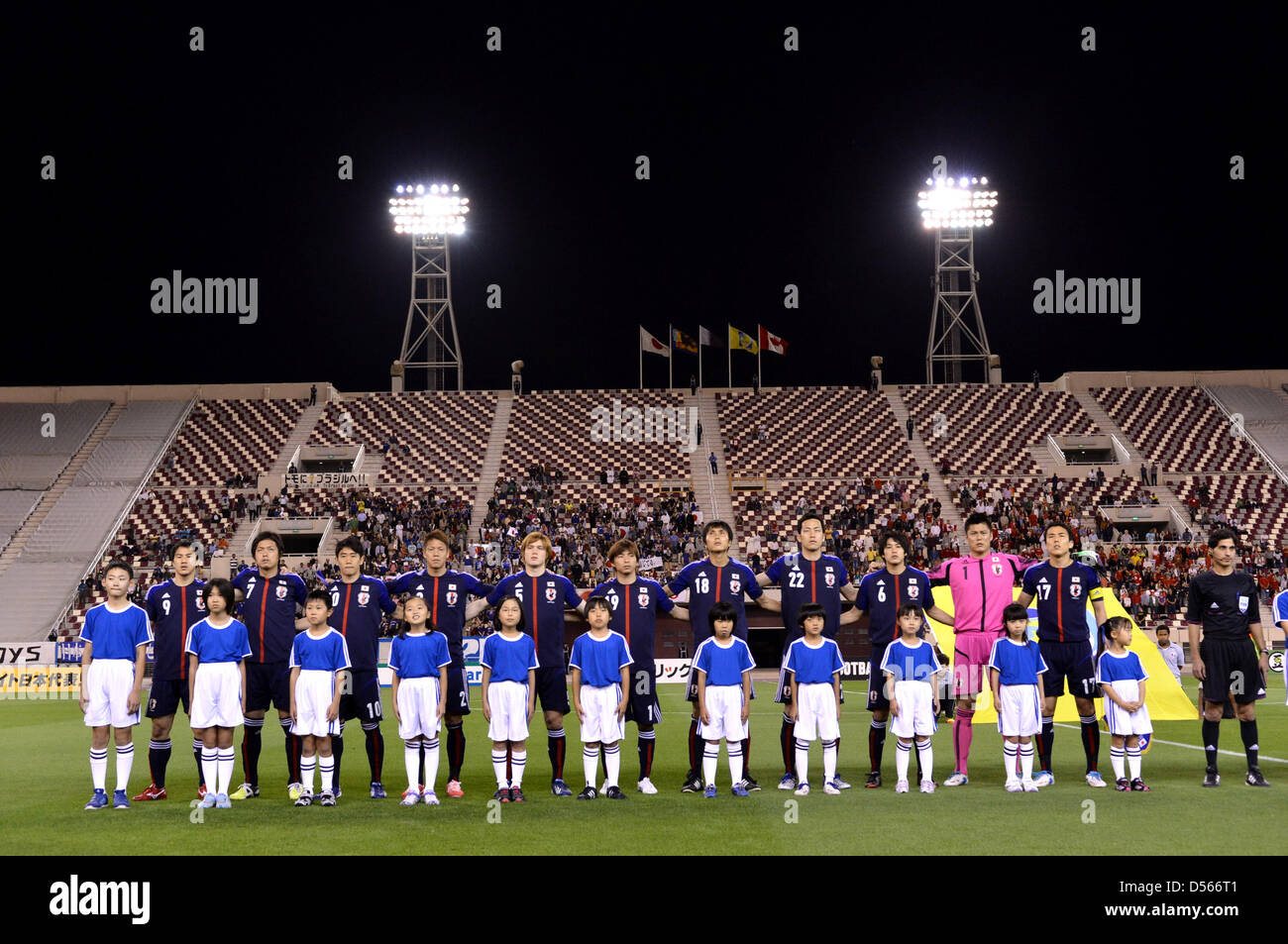 Japan team group line-up (JPN), MARCH 22, 2013 - Football / Soccer : Japan players (L-R) Shinji Okazaki, Yasuhito Endo, Shinji Kagawa, Masahiko Inoha, Gotoku Sakai, Takashi Inui, Ryoichi Maeda, Maya Yoshida, Atsuto Uchida, Eiji Kawashima and Makoto Hasebe line up before the International Friendly match between Japan 2-1 Canada at Khalifa International Stadium in Doha, Qatar. (Photo by Jinten Sawada/AFLO) Stock Photo