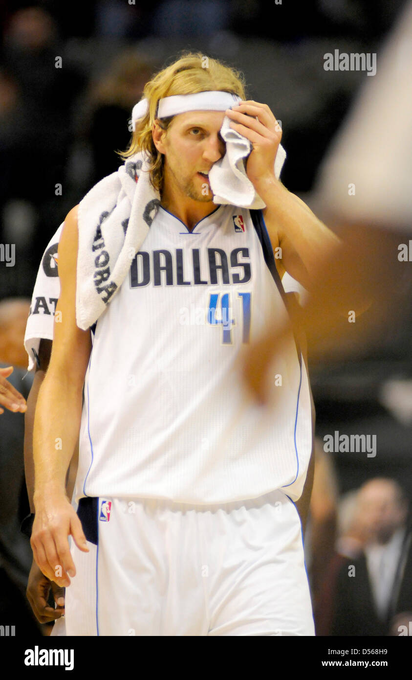 The Dallas Mavericks Dirk Nowitzki leaves the court after a 103 to 92 loss to the Denver Nuggets at the American Airlines Center in Dallas, Texas, USA, 6 November, 2010. The Nuggets defeated the Mavericks 103 to 92. Stock Photo