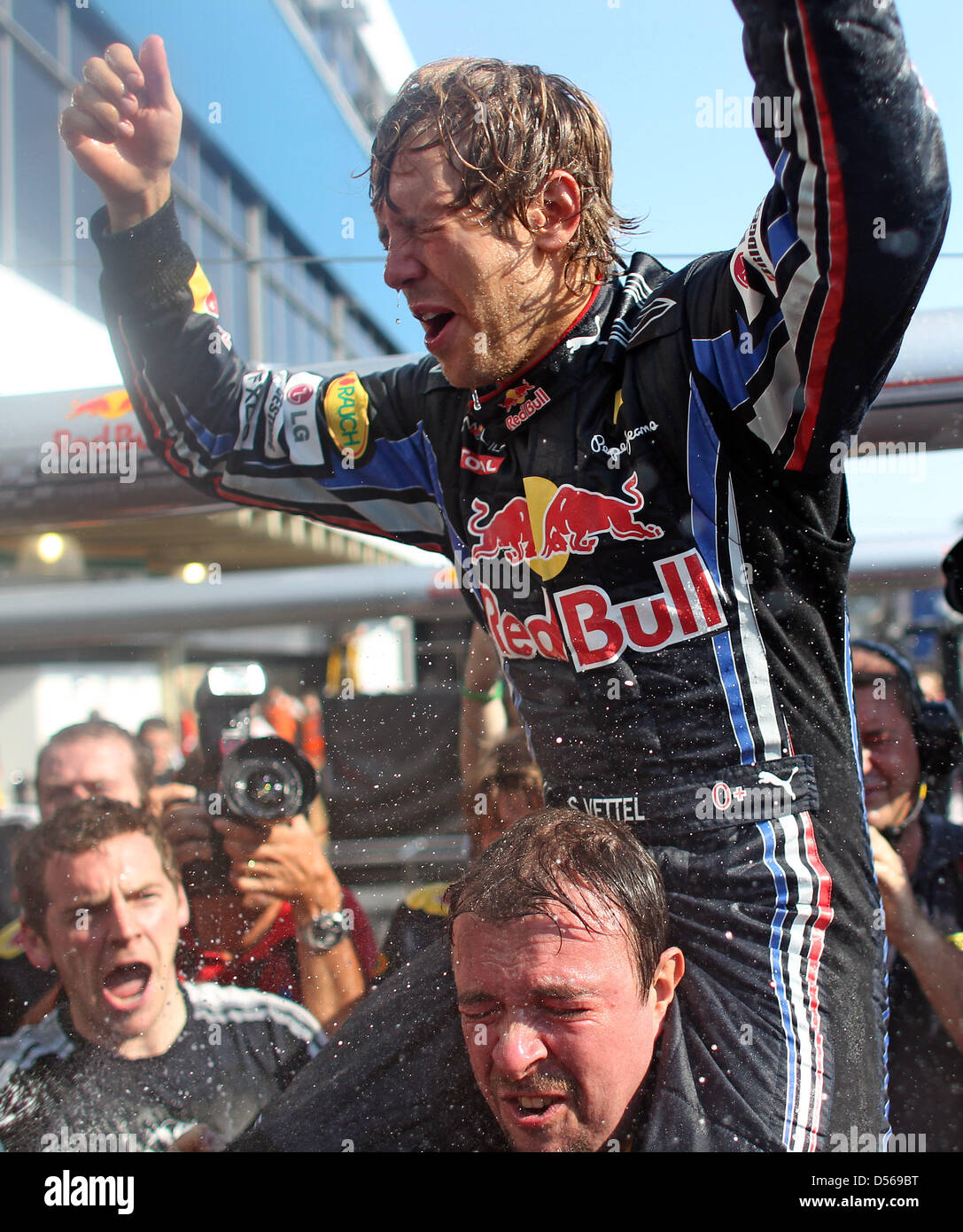 Seb Vettel 2010 Germany's Sebastian Vettel of Red Bull Racing celebrates winnign the ...