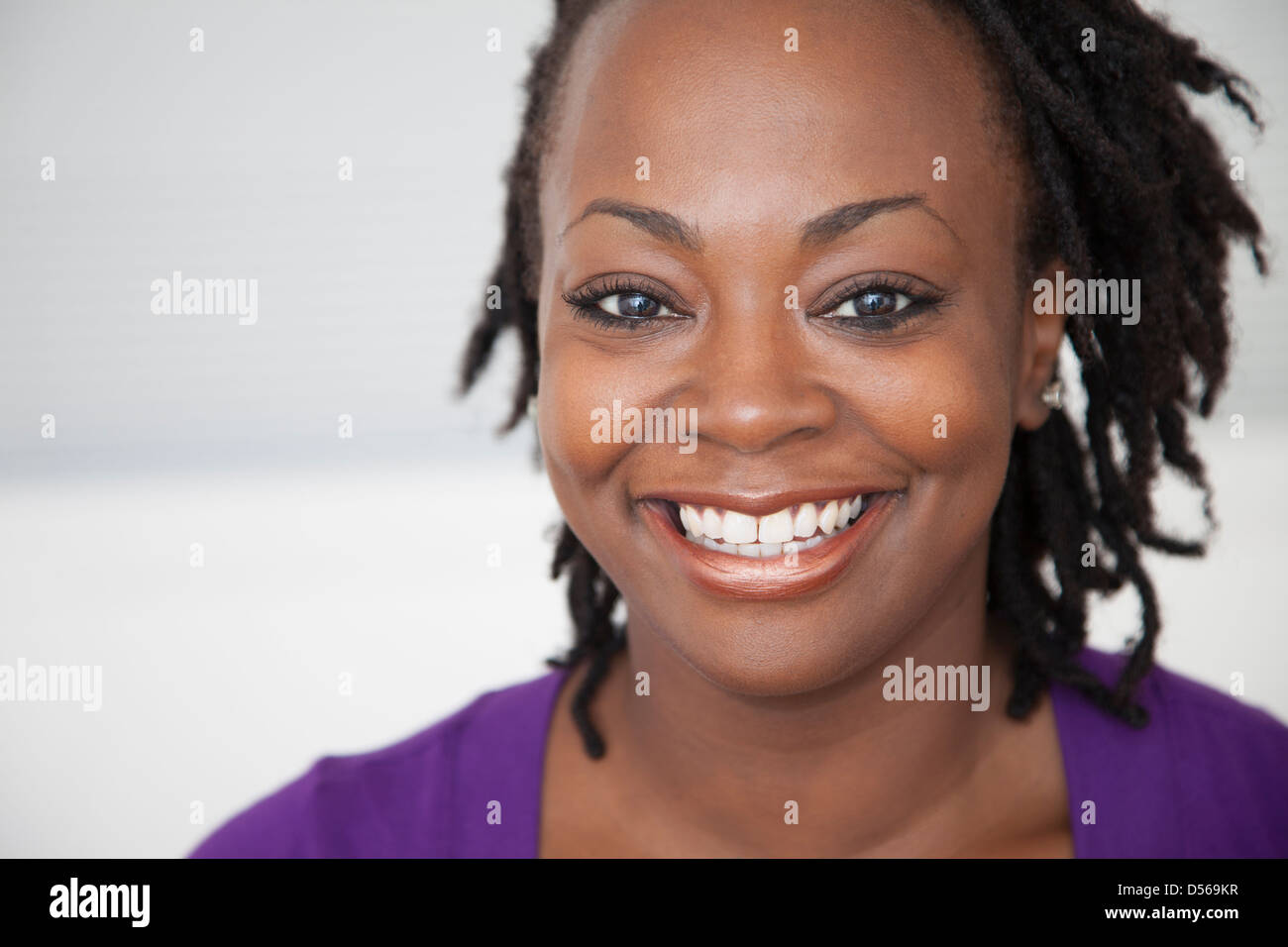 Smiling Black woman Stock Photo - Alamy