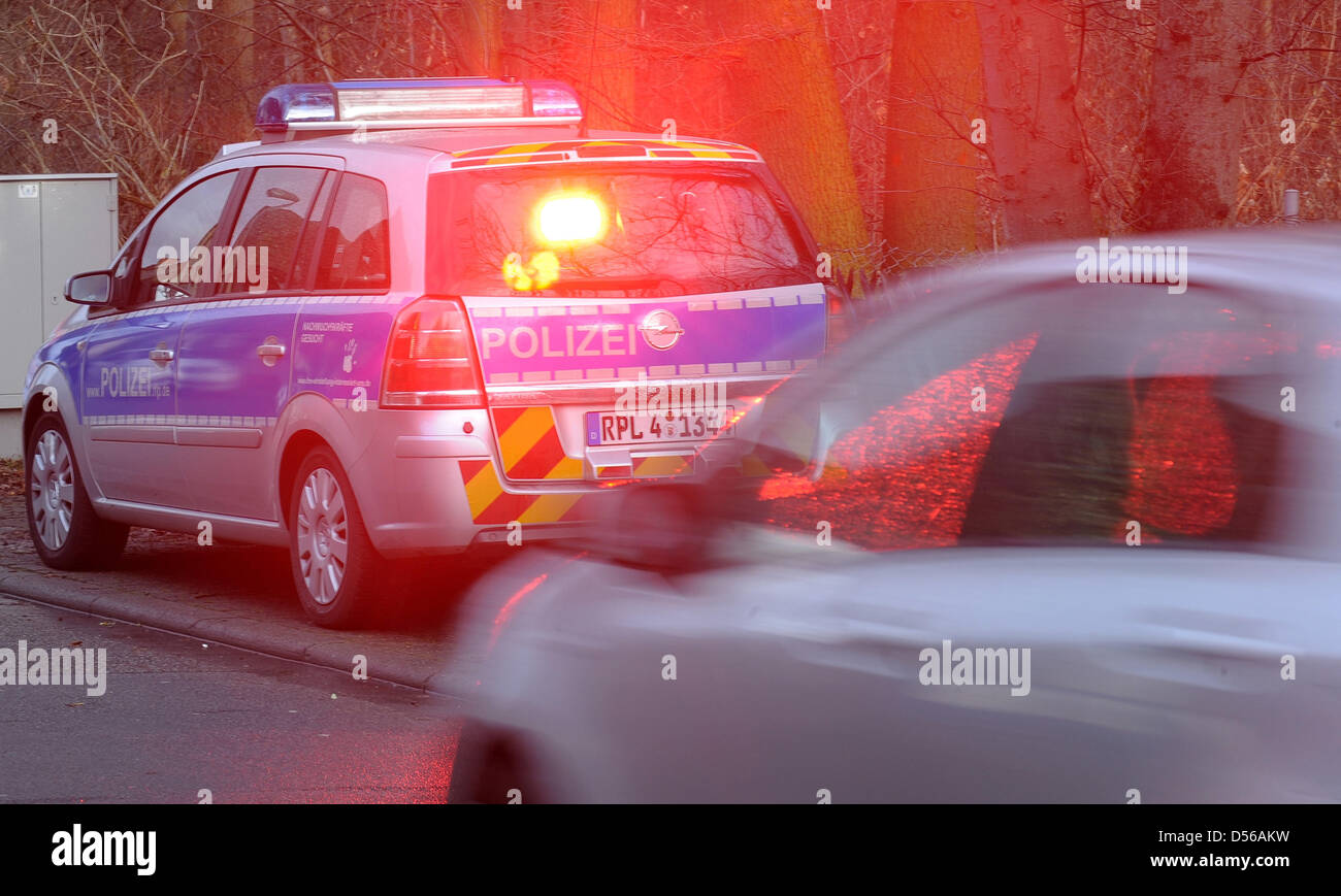 (FILE) - A picture dated 08 December 2009 shows a police car with radar equipment taking a picture of a car passing by during a speed monitoring in Schifferstadt, Germany. According to several newspaper reports on 10 November 2010, a judge in Herford absolved 40 monitored drivers, because he thinks speed traps are a rip-off. Judge Koerner demanded clearer laws concerning the speed  Stock Photo