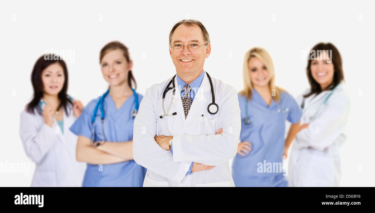 Successful young doctors smiling over a white background Stock Photo ...