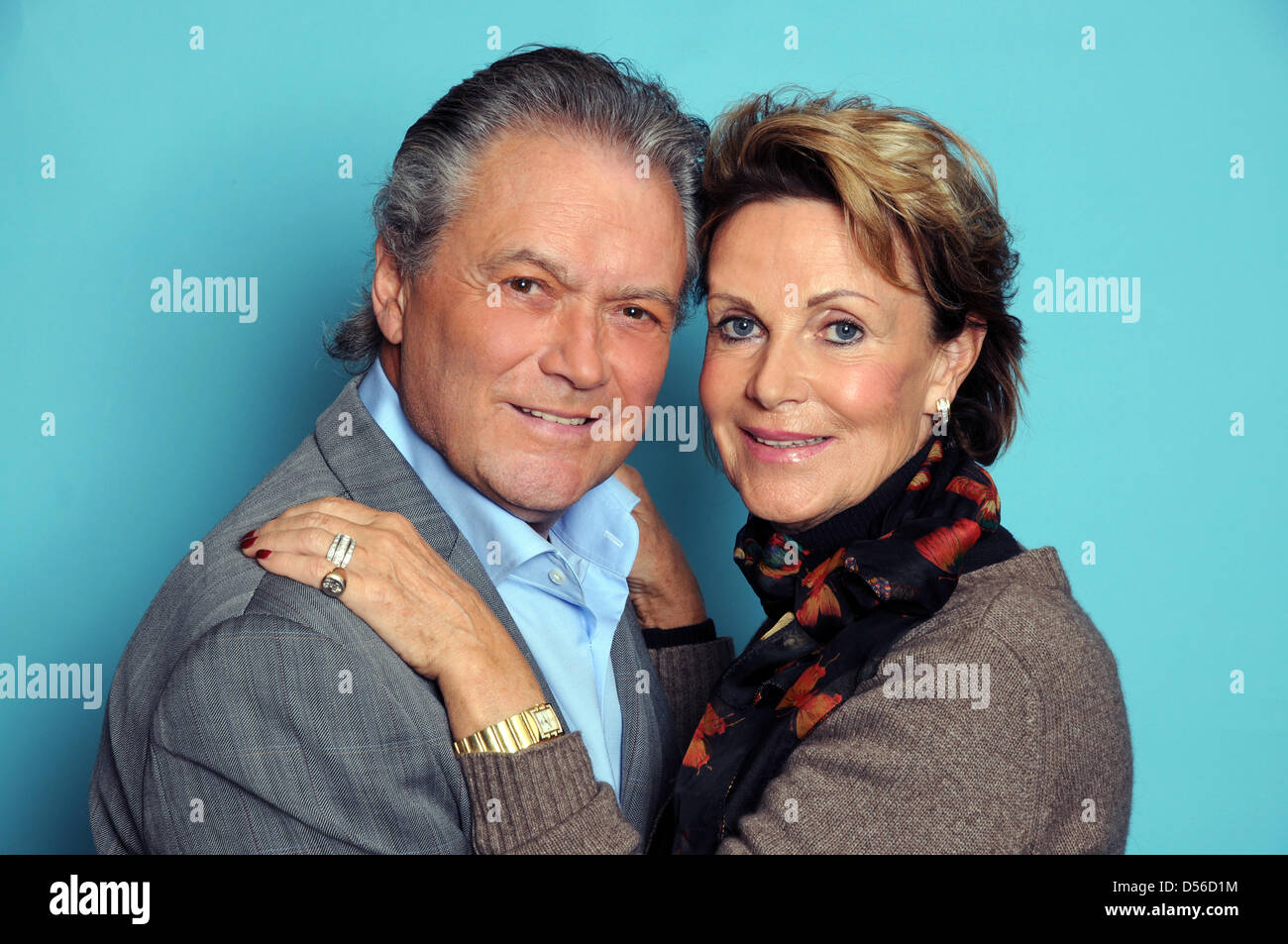 German figure skating icon and actor Hans-Juergen Baeumler (L) and his wife Marina (R) pose during a photo call in Cologne, Germany, 12 November 2010. Photo: Horst Ossinger Stock Photo