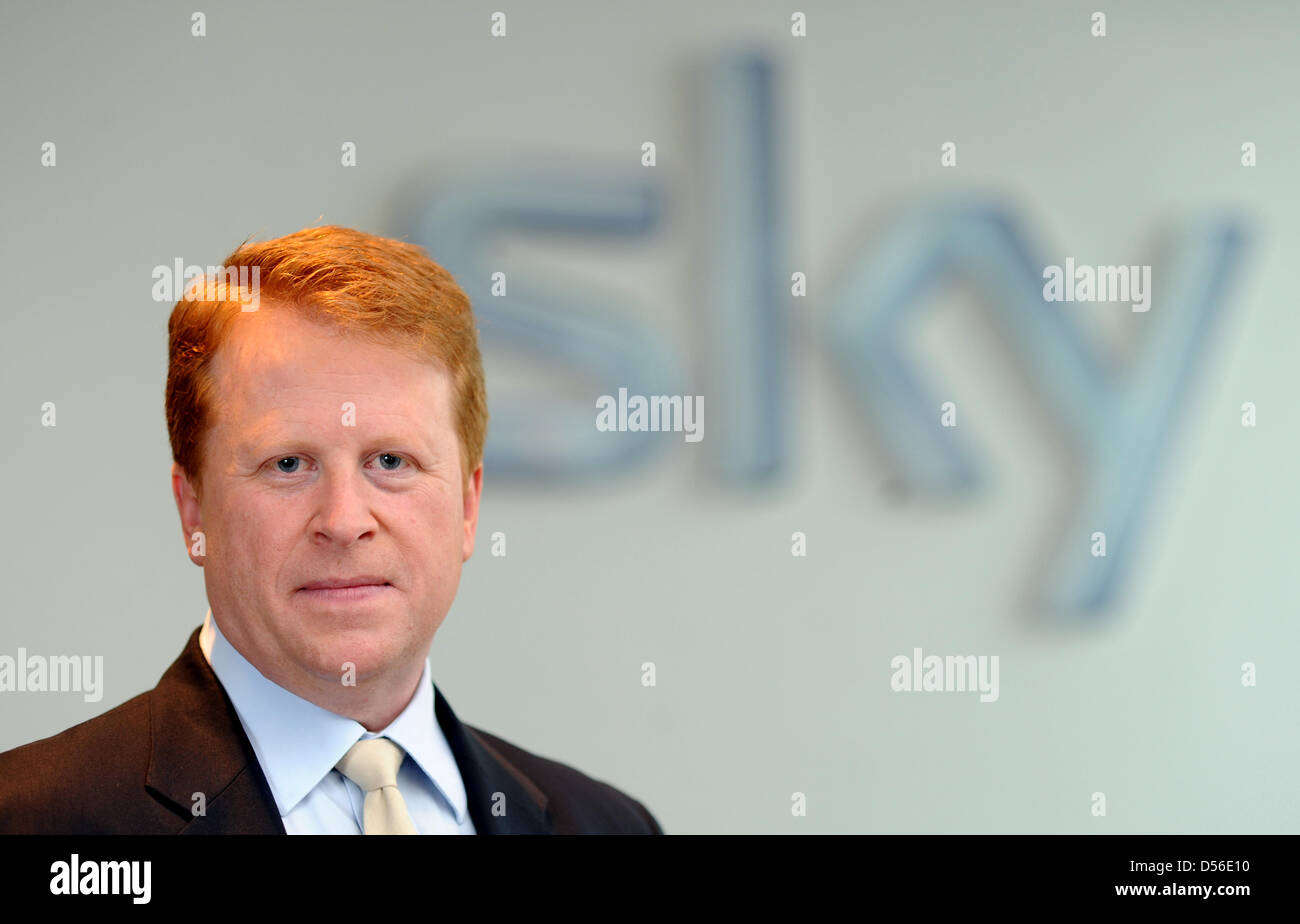 Chairman of the pay-TV broadcaster sky Germany Brian Sullivan is pictured next to the logo of the firm at the head office of skye Germany in Unterfoering near Munich, Germany, 15 November 2010. Sullivan is the head of the enterprize since 01 April 2010. Photo: ANDREAS GEBERT Stock Photo