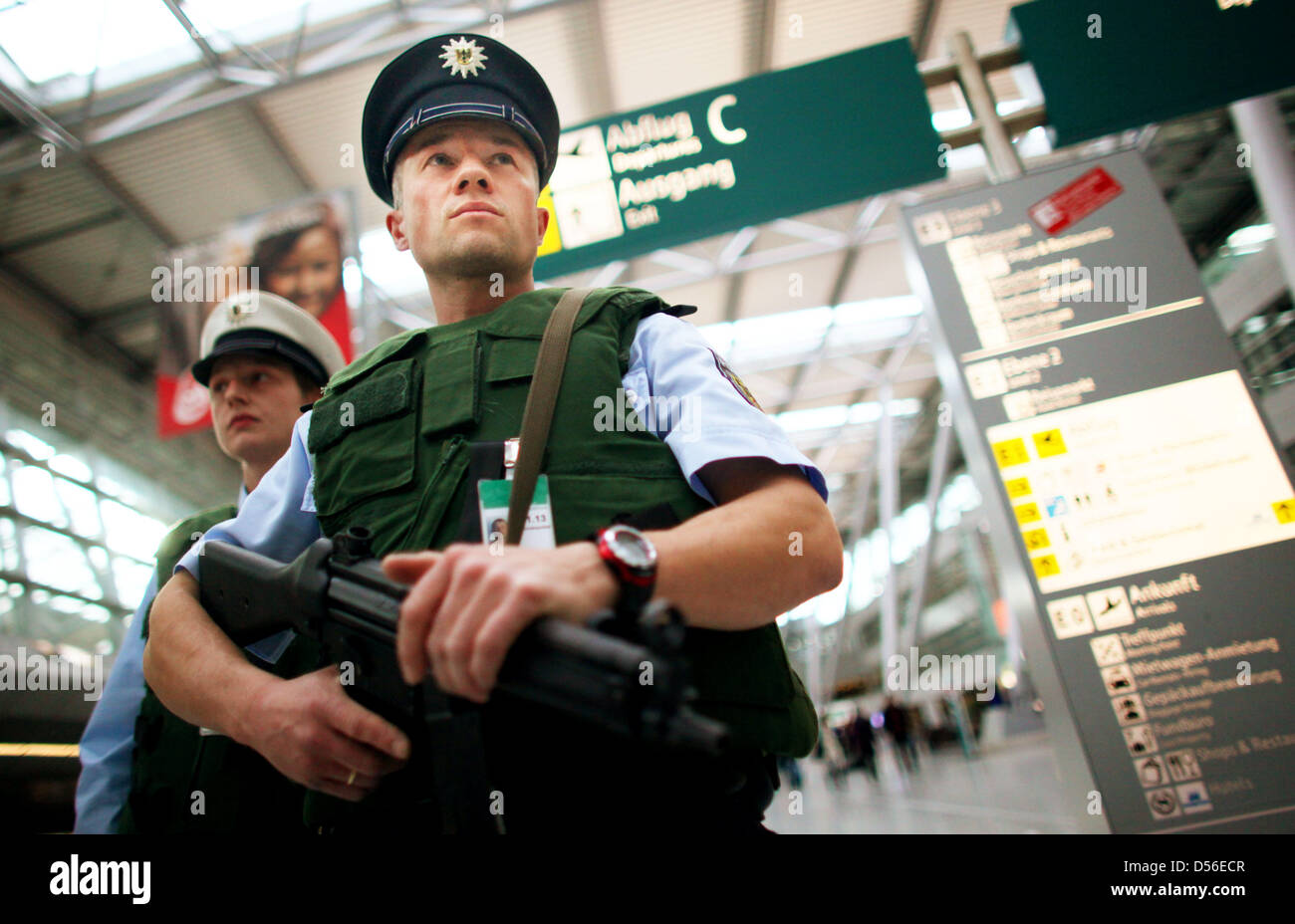 Police officers patrol at the airport in Duesseldorf, Germany, 18 November 2010. After the German government announced to have information on a presumed attack, that shall take place end of November 2010, security measures have been increased throughout Germany. Intensified controls are to be expected at train stations, airports and borders. Photo: Oliv Stock Photo