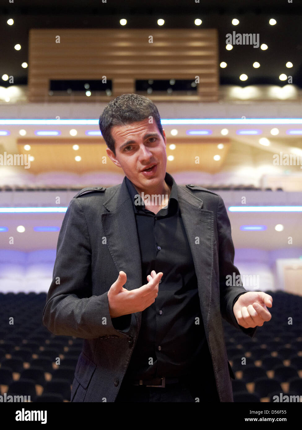 French countertenor singer Philippe Jaroussky poses in the empty aula of the concert hall in Dortmund, Germany, 17 November 2010. Jaroussky will launch his tour through Germany with an aria evening in Dortmund. Further stops are Baden-Baden, Nuremberg, Munich, Hamburg and Berlin. Photo: Bernd Thissen Stock Photo