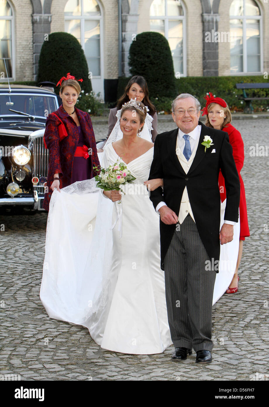 Bride Annemarie Gualtherie van Weezel arrives with her father Hans