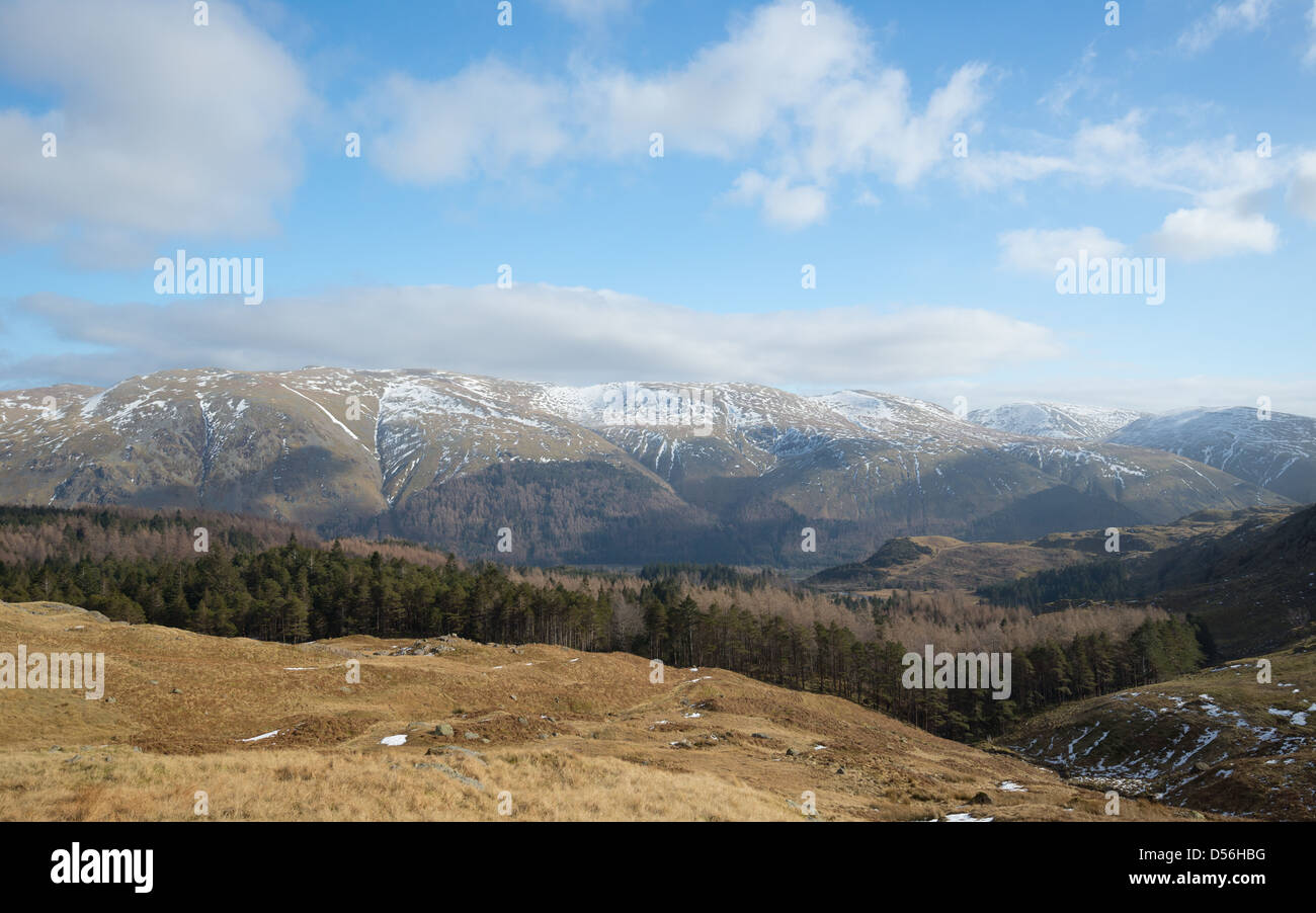 The Hevellyn mountain range from near Blea Tarn, above Thirlmere, in the Lake District in March. Stock Photo