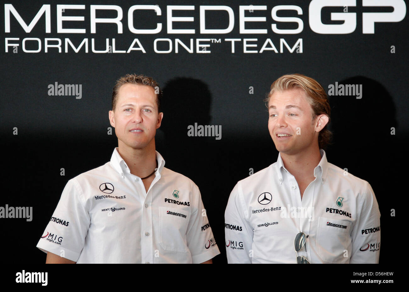 German Formula One drivers Michael Schumacher (L) and Nico Rosberg ...