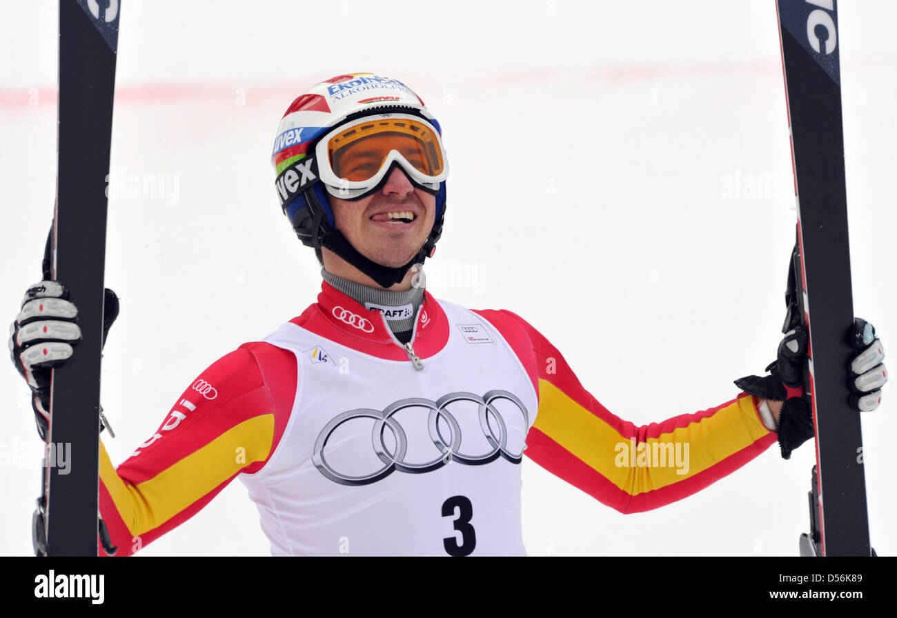Germany's Felix Neureuther cheers over his victory at the finish line during World Cup Finals in Slalom in Garmisch-Partenkirchen, Germany, 13 March 2010. Photo: PETER KNEFFEL Stock Photo