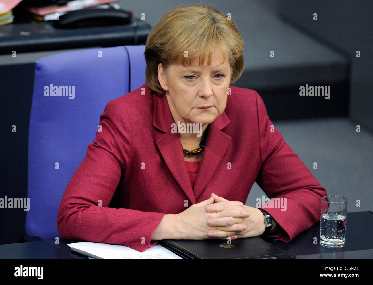 German Chancellor Angela Merkel speaks during the Bundestag budget debate in Berlin, Germany, 17 March 2010. Merkel prepared the citizens for a strict policy of savings, backed up Finance Minister Schaeuble and criticised the expenditure plans of the single ministries for the next year. Merkel spoke of a Herculean task and difficult budget cuts. Photo: RAINER JENSEN Stock Photo