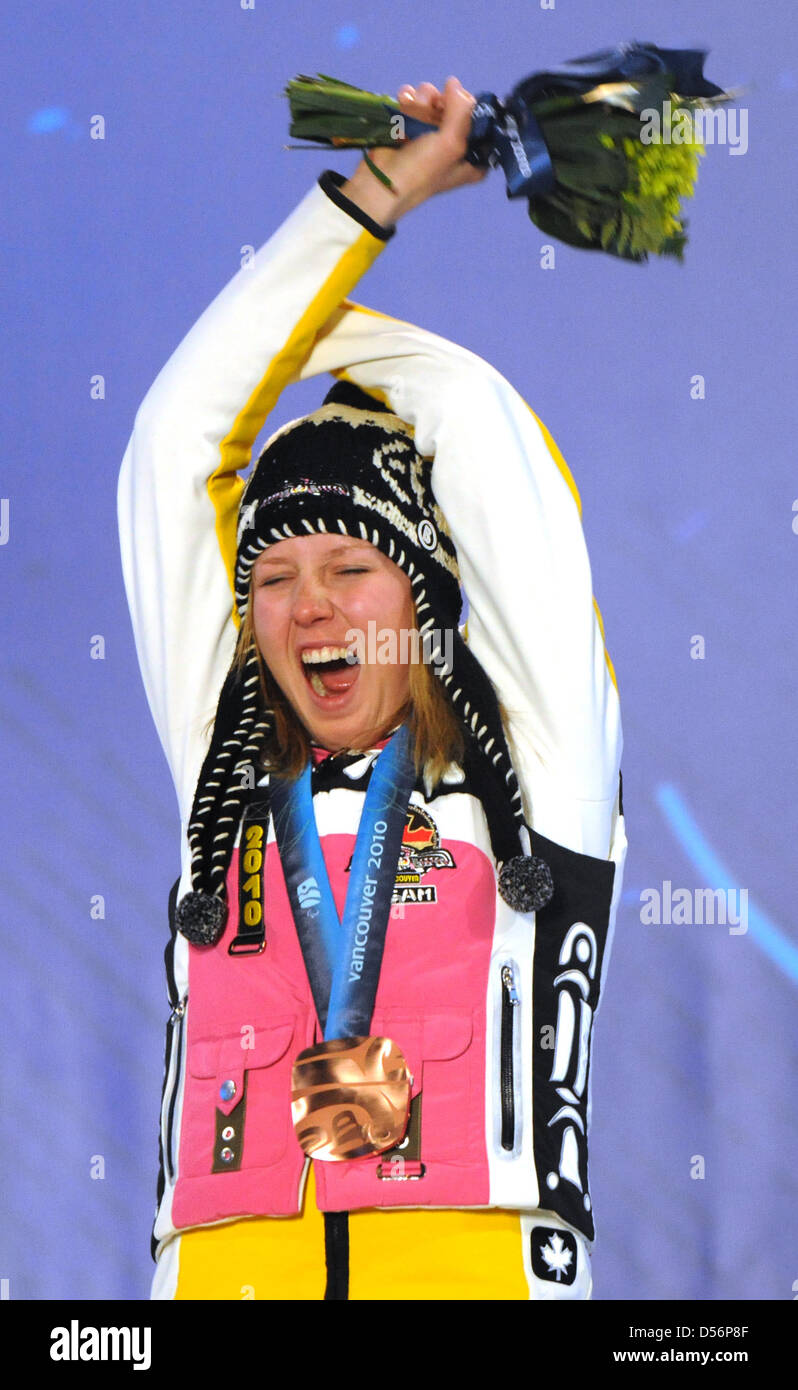 Andrea Rothfuss freut sich am Donnerstag (18.03.2010) über den Gewinn der Bronzemedaille bei der Abfahrt (Stehend) bei den Paralympics 2010 in Whistler, Kanada. Foto: Julian Stratenschulte dpa Stock Photo