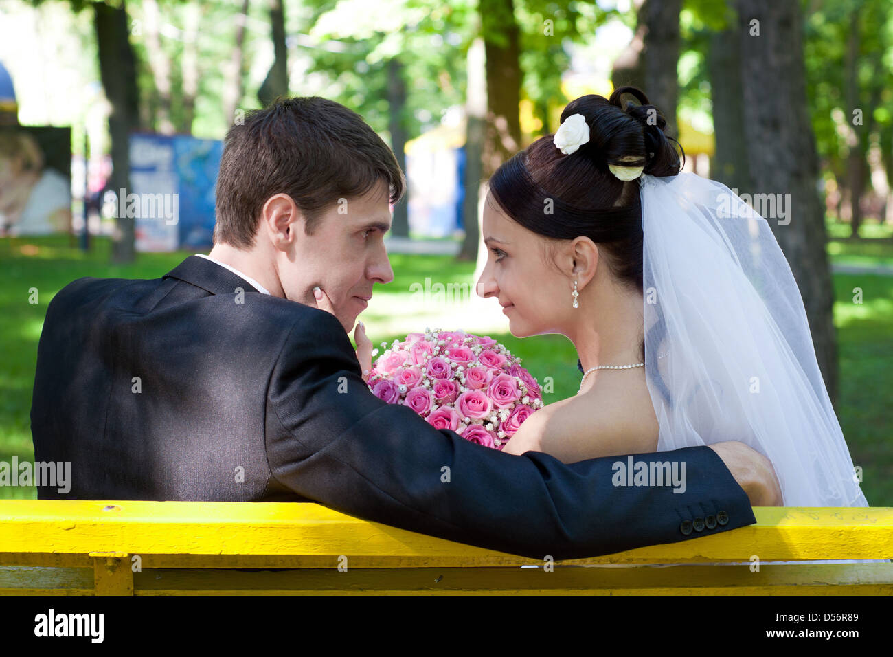 Newly married couple sits in hi-res stock photography and images - Alamy