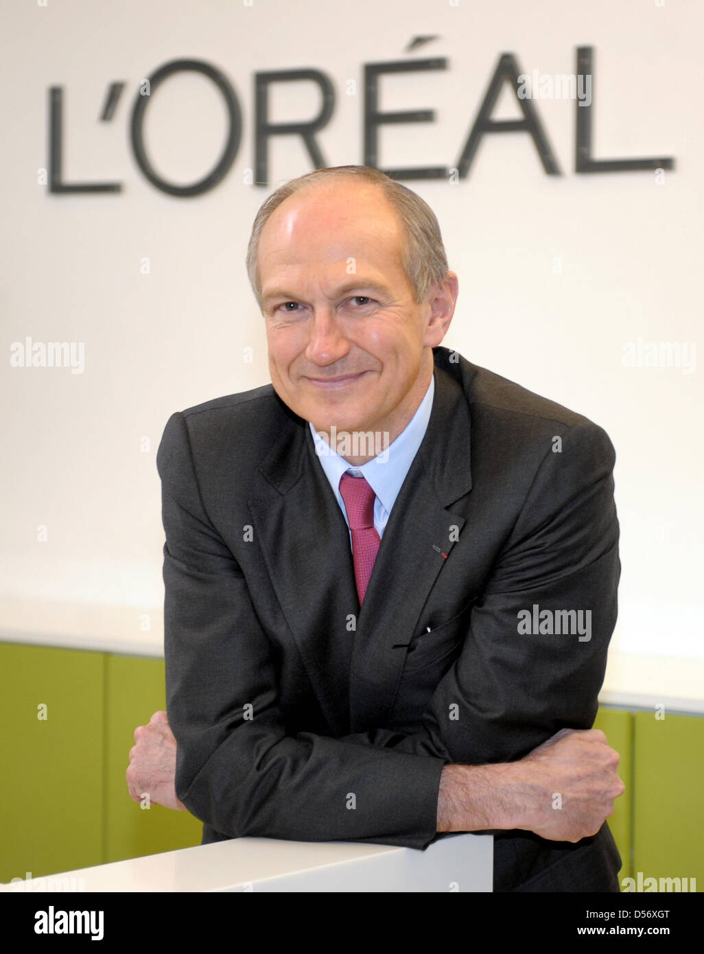 L’Oreal CEO Jean-PAul Agon smiles in the German headquarters of the