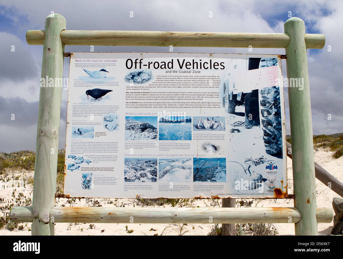 Sign warning of the damage of road vehicles can do to the local environment. Stock Photo