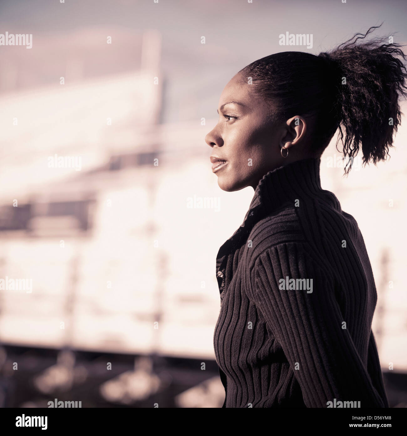 Woman side profile confident walking hi-res stock photography and ...