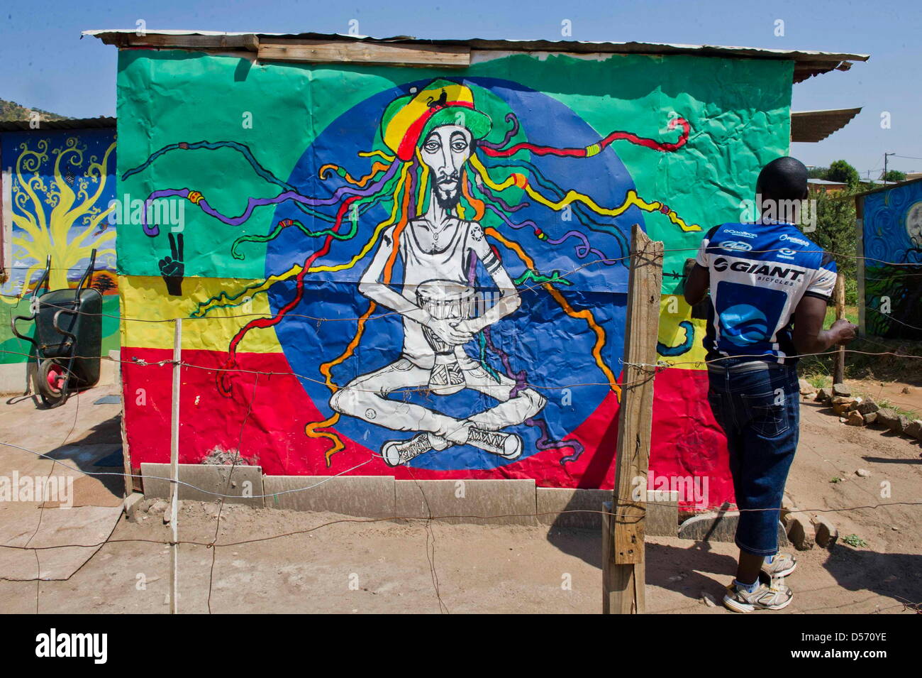 Mamelodi, South Africa. 24th March, 2013. David Chauke stands outside