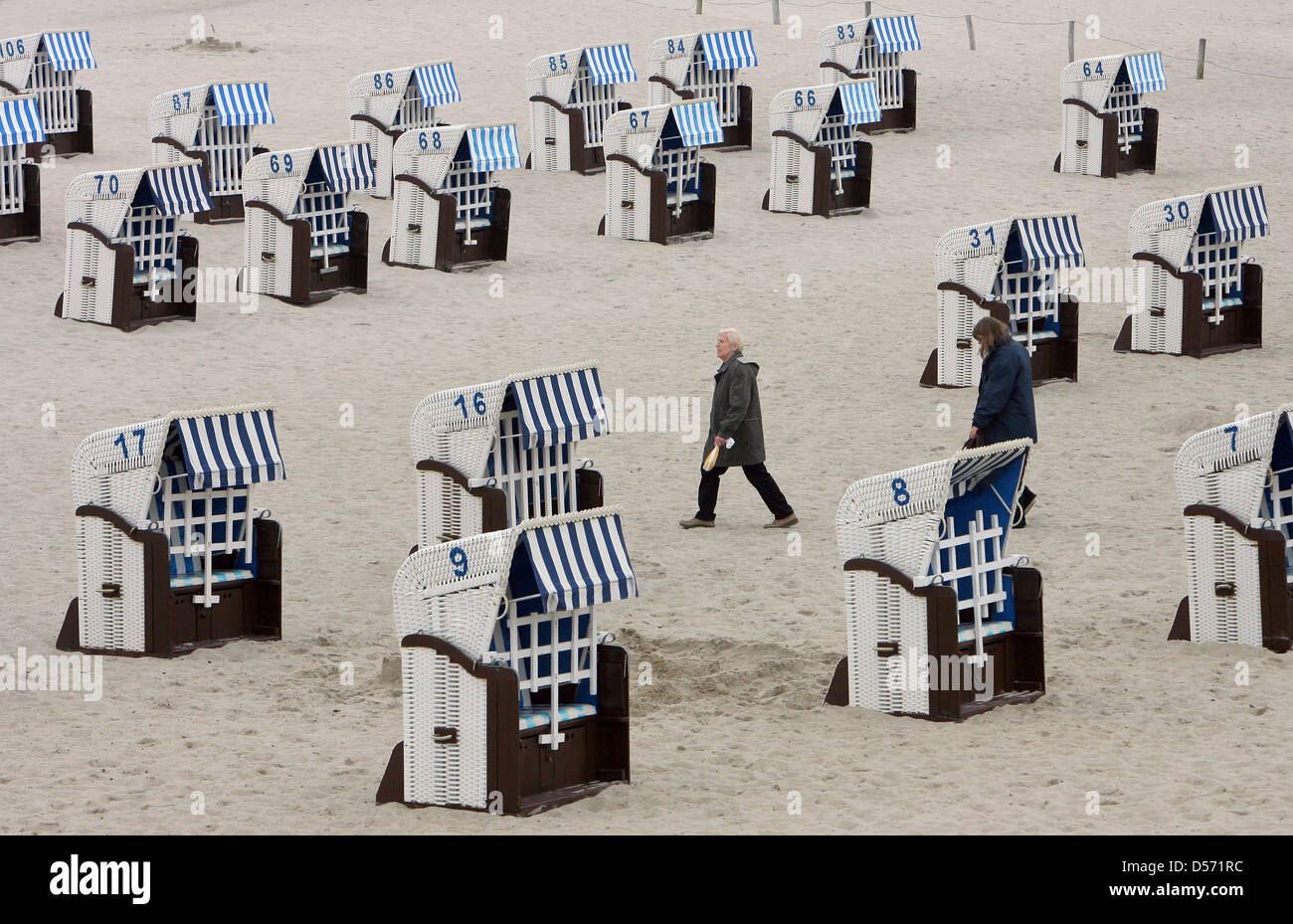 The first beach chairs wait for visitors on the beach of Baltic Sea spa ...