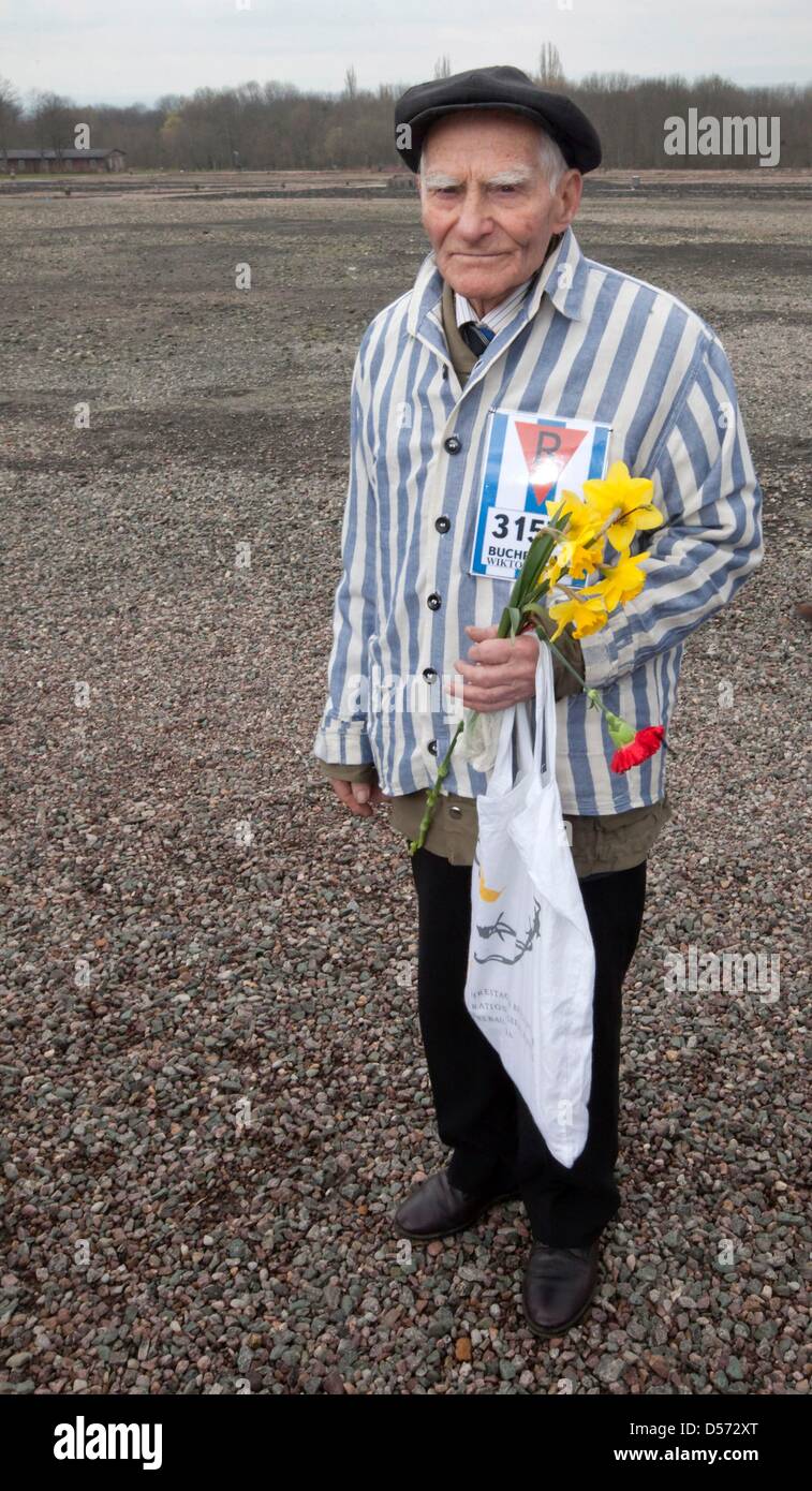 Wiktor Karpus from Ukraine, survivor of the concentration camp Buchenwald, stands on the compoud of the camp Buchenwald near Weimar, Germany, 11 April 2010. Survivors, US-Veterans and relatives commemorate in Buchenwald the release of the concentration camp 65 years ago. With a wreath laying on the former parade ground, 56,000 deads, who were killed or starved to death in the conce Stock Photo