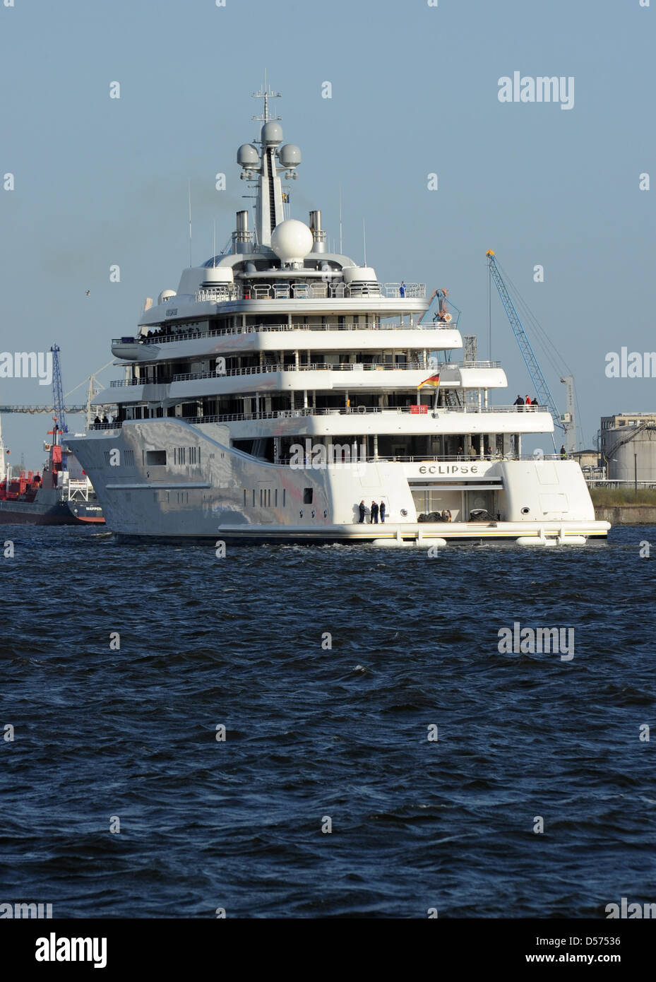 Luxury yacht 'Eclipse', which is allegedly owned by Russian billionaire Roman Abramowitsch, leaves dock 10 of Blohm+Voss shipyards in Hamburg, Germany, 16 April 2010. The yacht features nine decks, one pool, a disco, 20 Jet-Skis, four motorboats and two helicopter landing areas. According to experts the ship is the most expensive privately owned yacht in the world, with an estimate Stock Photo
