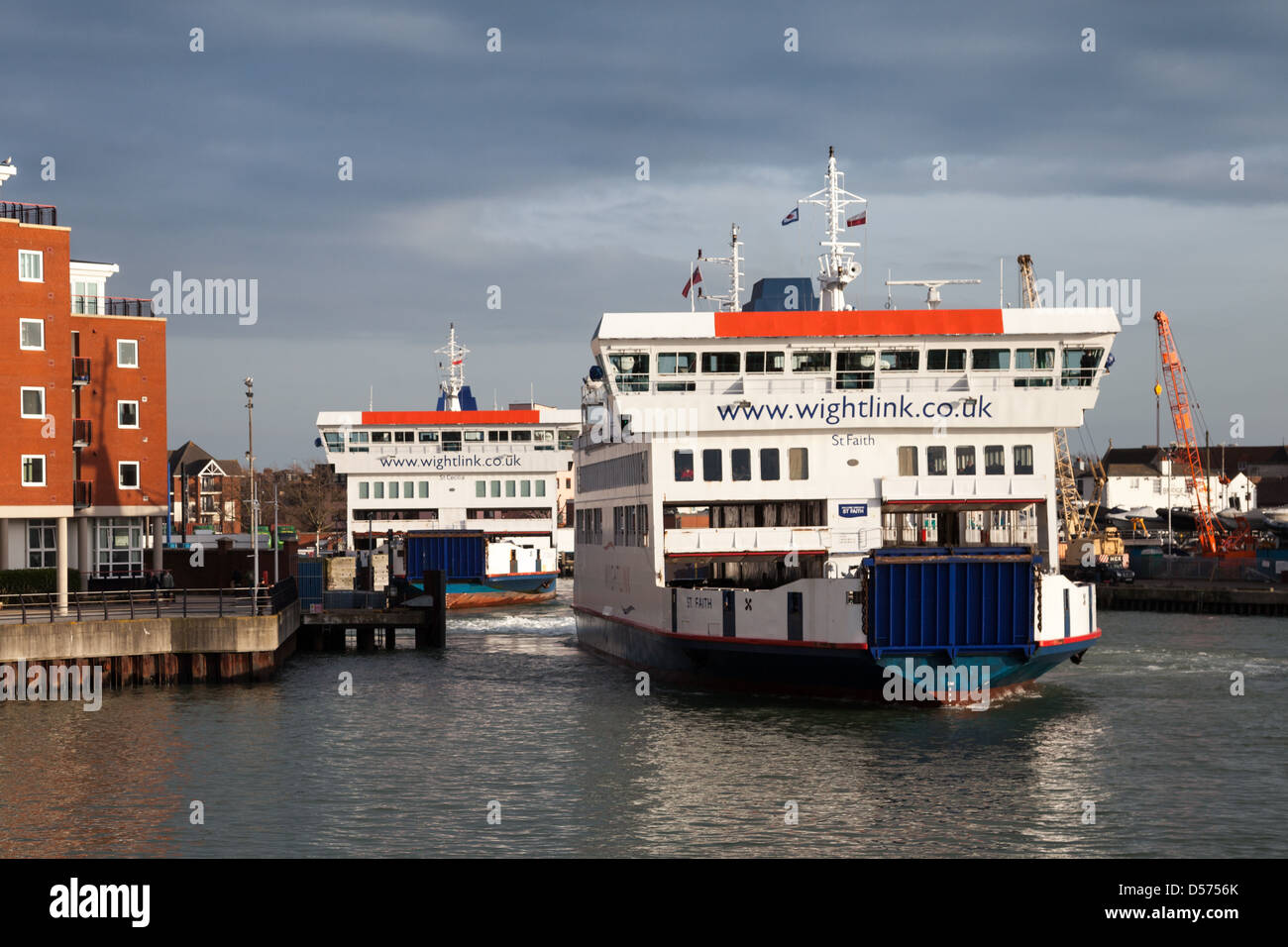 Wightlink car ferries, St. Faith & St. Cecilia, at Gunwharf Ferry Terminal in Portsmouth, Hampshire, UK Stock Photo