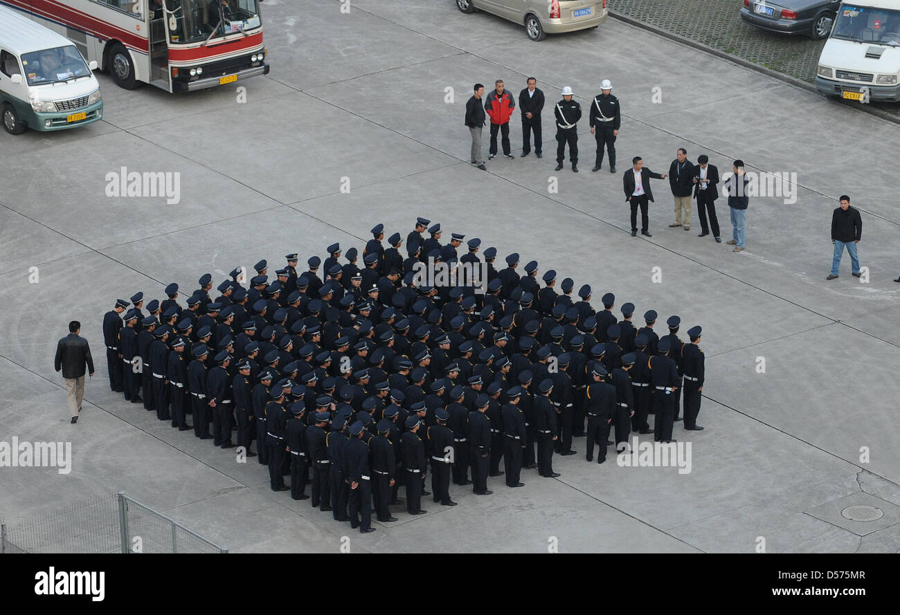 Chinese security forces at Shanghai International Circuit in Shanghai, China, 17 April 2010. The Formula 1 Chinese Grand Prix was held on 18 April. Photo: Peter Steffen Stock Photo