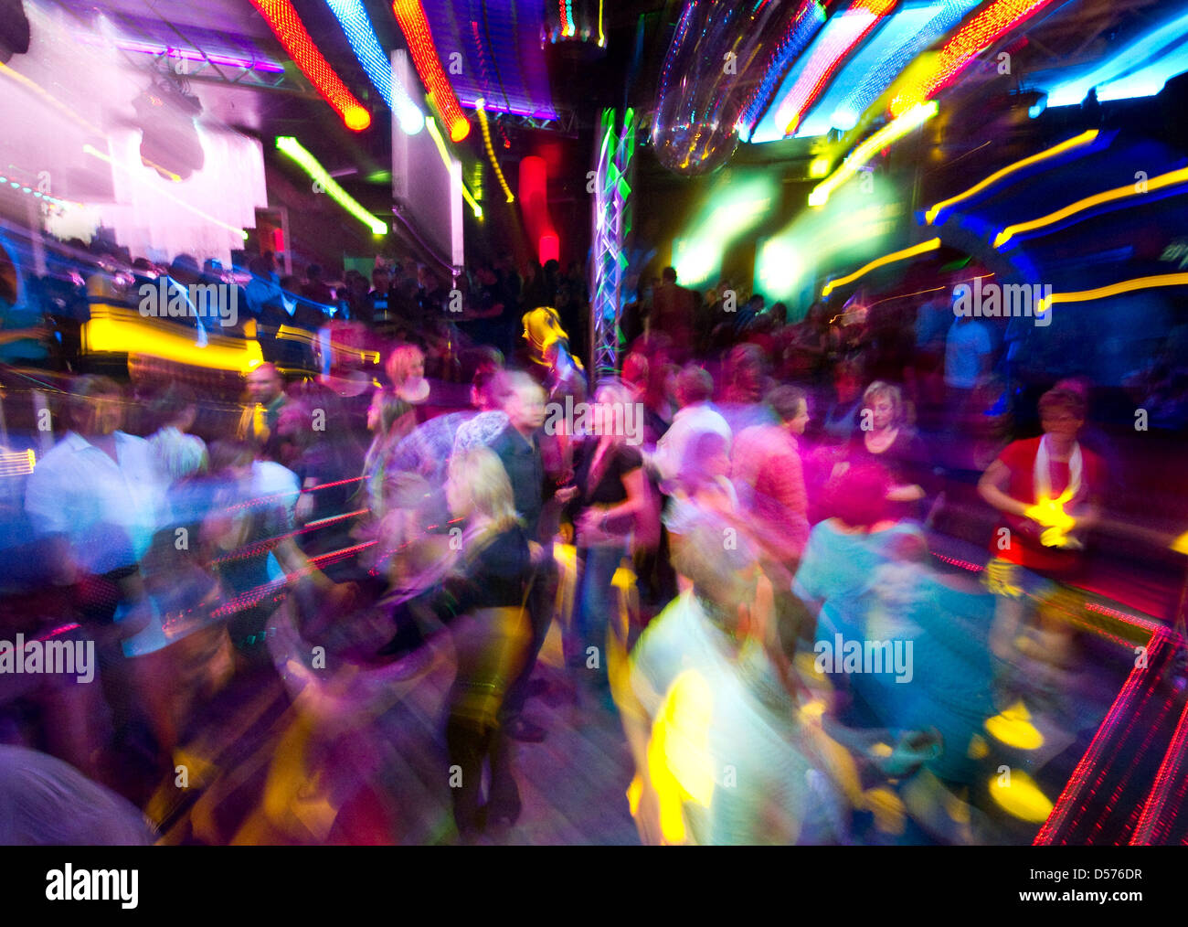 Party guests dance in a club only for thirty-year-olds and older, the Discotheque Bellevue in Frankfurt/Oder, Germany, 17 April 2010. Photo: Patrick Pleul Stock Photo