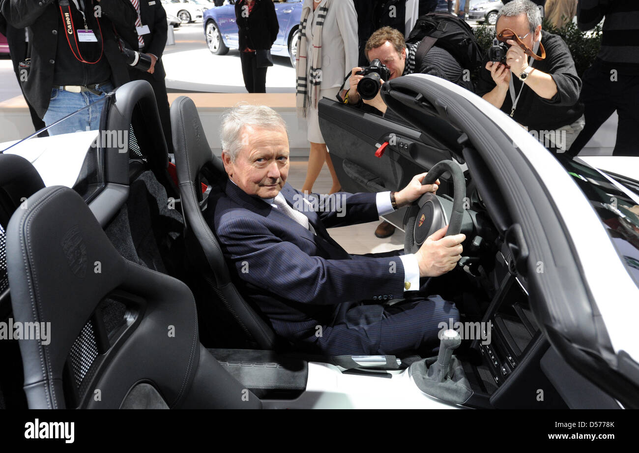 Wolfgang Porsche, chairman of the Porsche AG supervisory board, sits in a Porsche Boxter Spyder prior to the general meeting of Volkswagen AG in Hamburg, Germany, 22 April 2010. Europe's largest automaker Volkswagen increased its profits in the first quarter of 2010. The earnings after taxes increased by nearly 95 per cent to 473 million euros, the turnover increased by 19 per cent Stock Photo