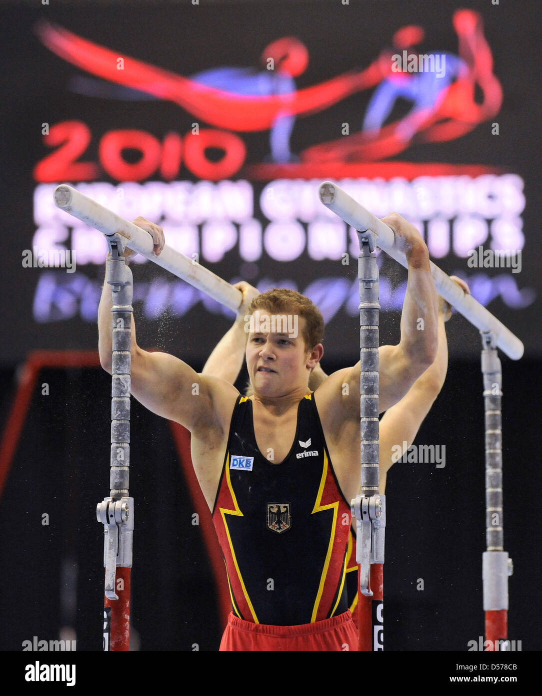 German gymnasts Fabian Hambuechen performs at the parallel bars at the European Championships
