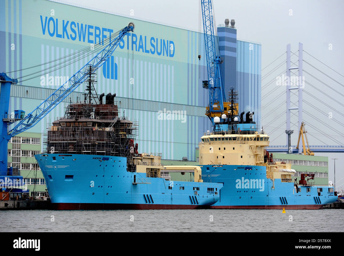 Two new anchor handling tug supply vessels (AHTS) lie towed at Volkswerft Stralsund shipbuilding company in Stralsund, Germany, 20 April 2010. The ships were built for world's biggest container ship shipowning company Maersk and will be used for mooring of deep-sea drilling platforms and the offshore sector. Photo: Stefan Sauer Stock Photo