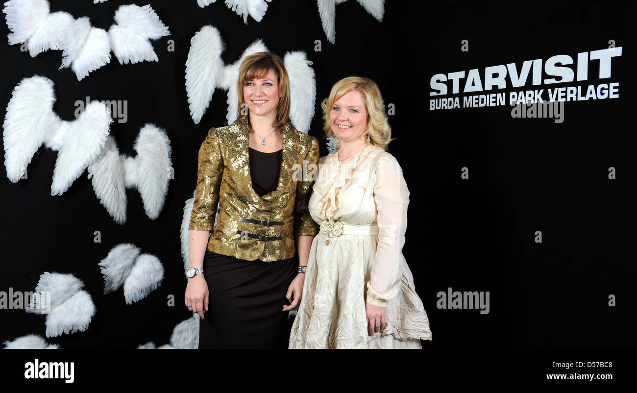 Princess Maertha Louise of Norway (L) and Elisabeth Samnoy (R) pose during the 'Starvisit' talk show in Offenburg, Germany, 03 May 2010. The talk show is organised by Burda publishing house. Maertha Louise of Norway (L) and Elisabeth Samnoy presented their book 'Schutzengel begleiten Dich' ('Guardian Angels accompany you'). Photo: PATRICK SEEGER Stock Photo