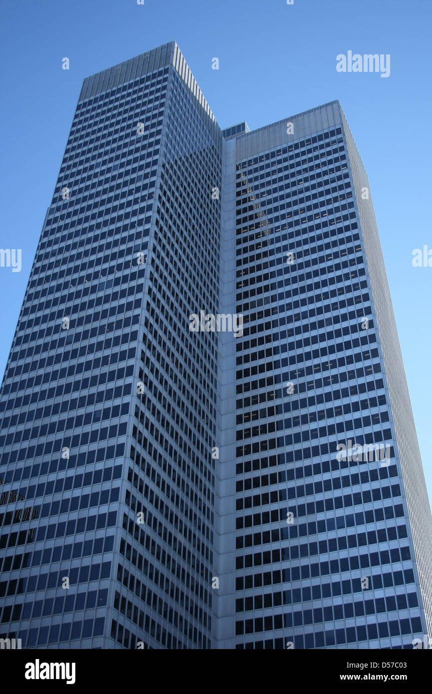 Corporate tower. Office building against the blue sky Stock Photo - Alamy
