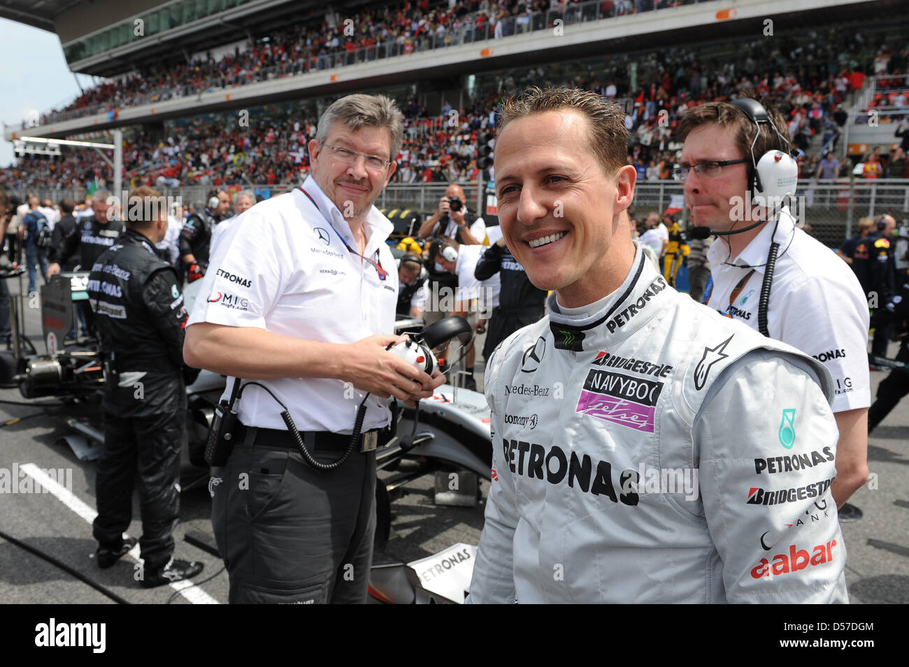 German driver Michael Schumacher of Mercedes GP (C), his British team ...